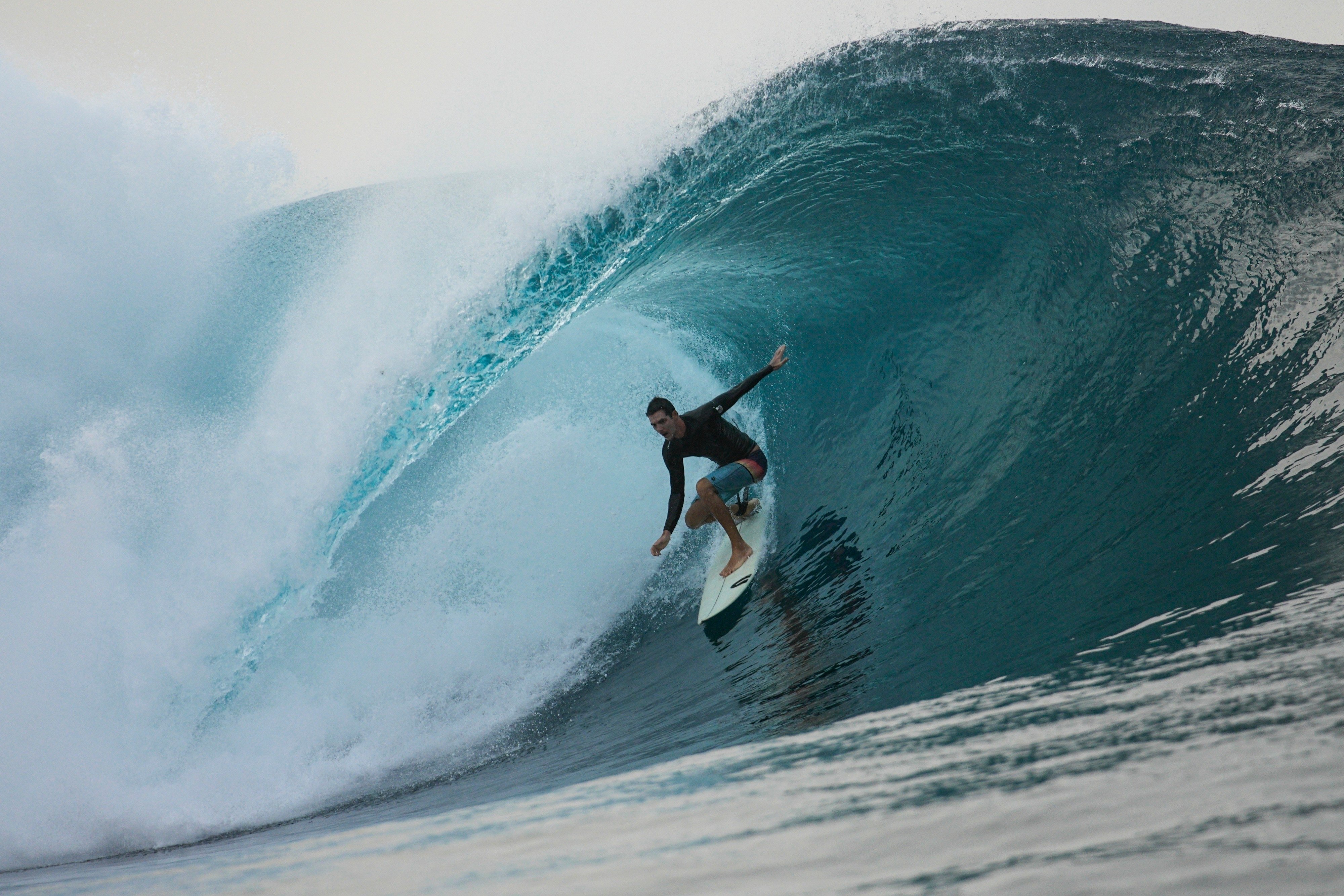 A surfer rides a wave in Teahupo’o, Tahiti, French Polynesia. The world-famous surf spot is set to host the 2024 Paris Olympics surfing competition. Photo: AP