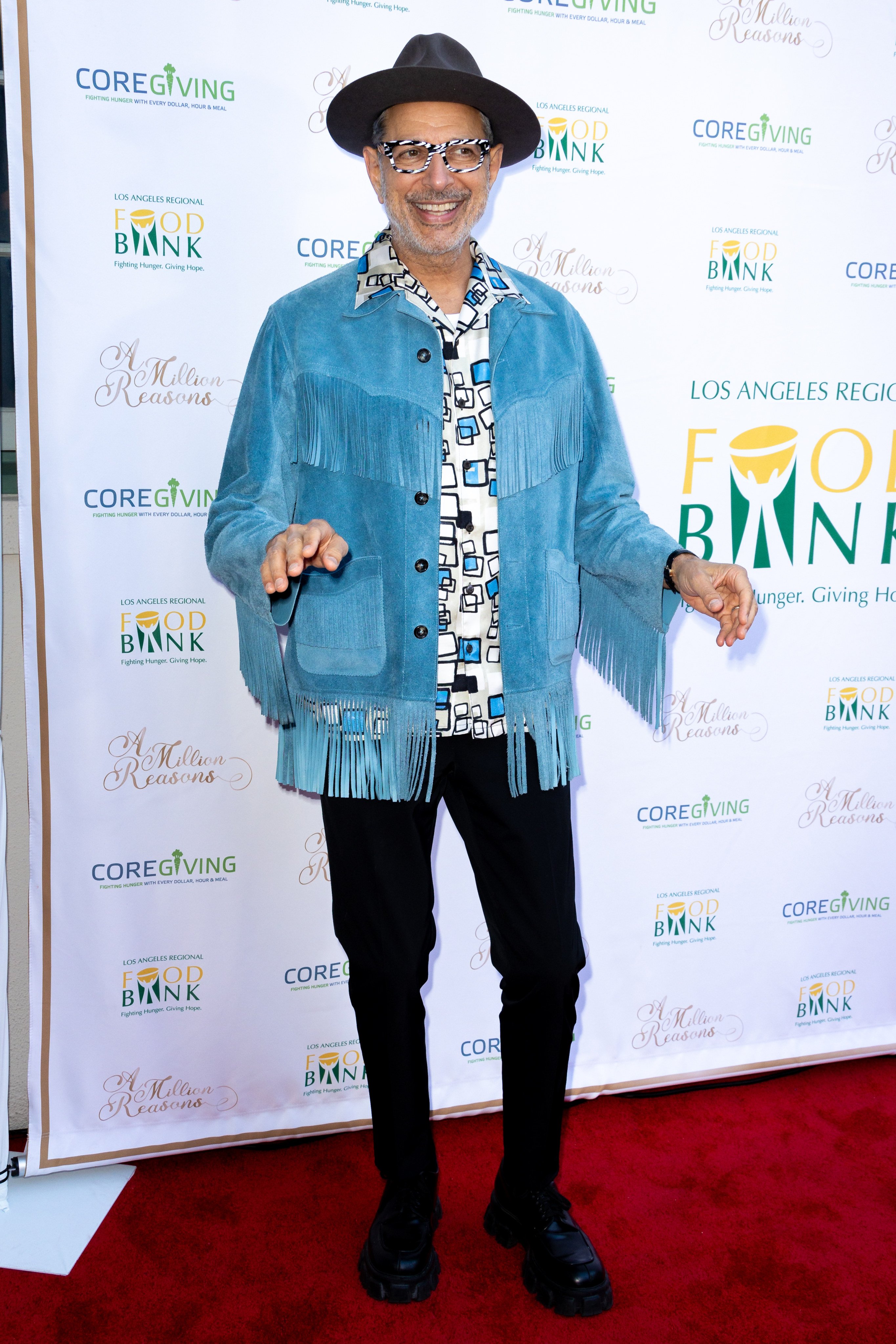 Jeff Goldblum attends last year’s LA Regional Food Ban’s A Million Reason celebration in Hollywood, California. Achieve a similar look with strikingly cool pieces from Maison Michel, Jacquemus and Saint Laurent. Photo: Getty Images