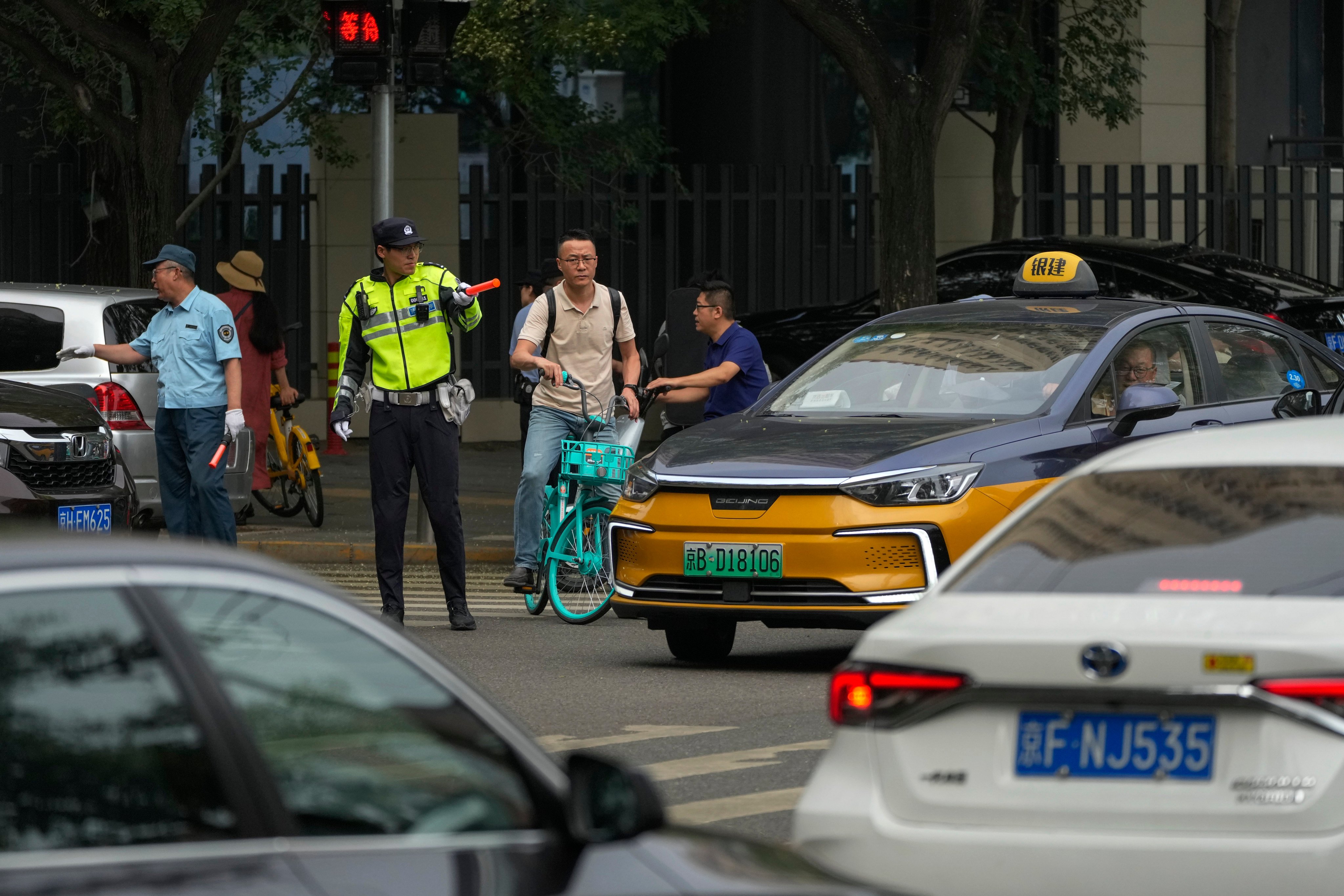 Many Chinese metropolises had imposed car purchase restrictions to ease traffic congestion and reduce pollution. Photo: AP