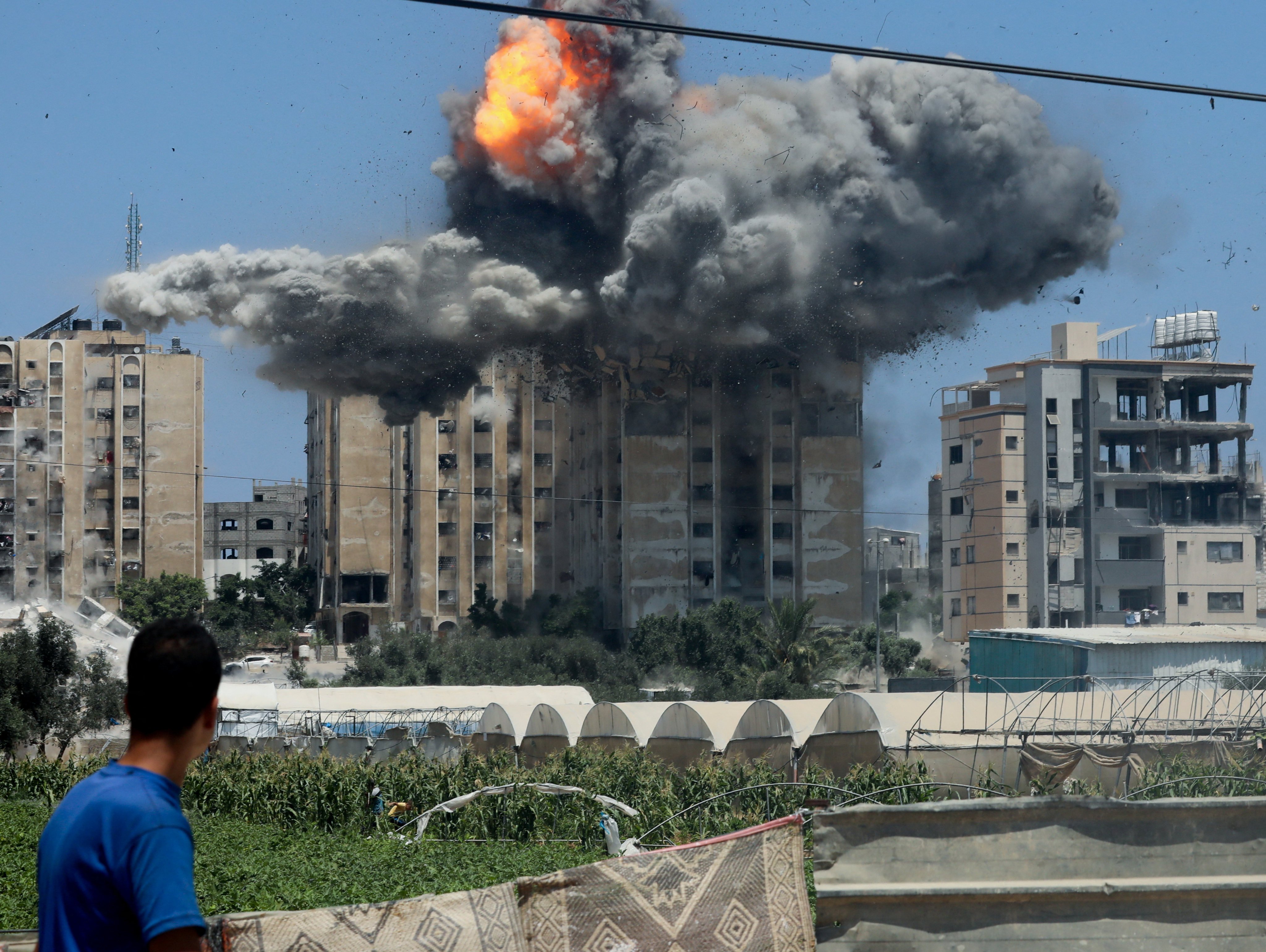 A residential building explodes in Nuseirat in the central Gaza Strip amid the Israel-Gaza conflict on July 20. Photo: Reuters