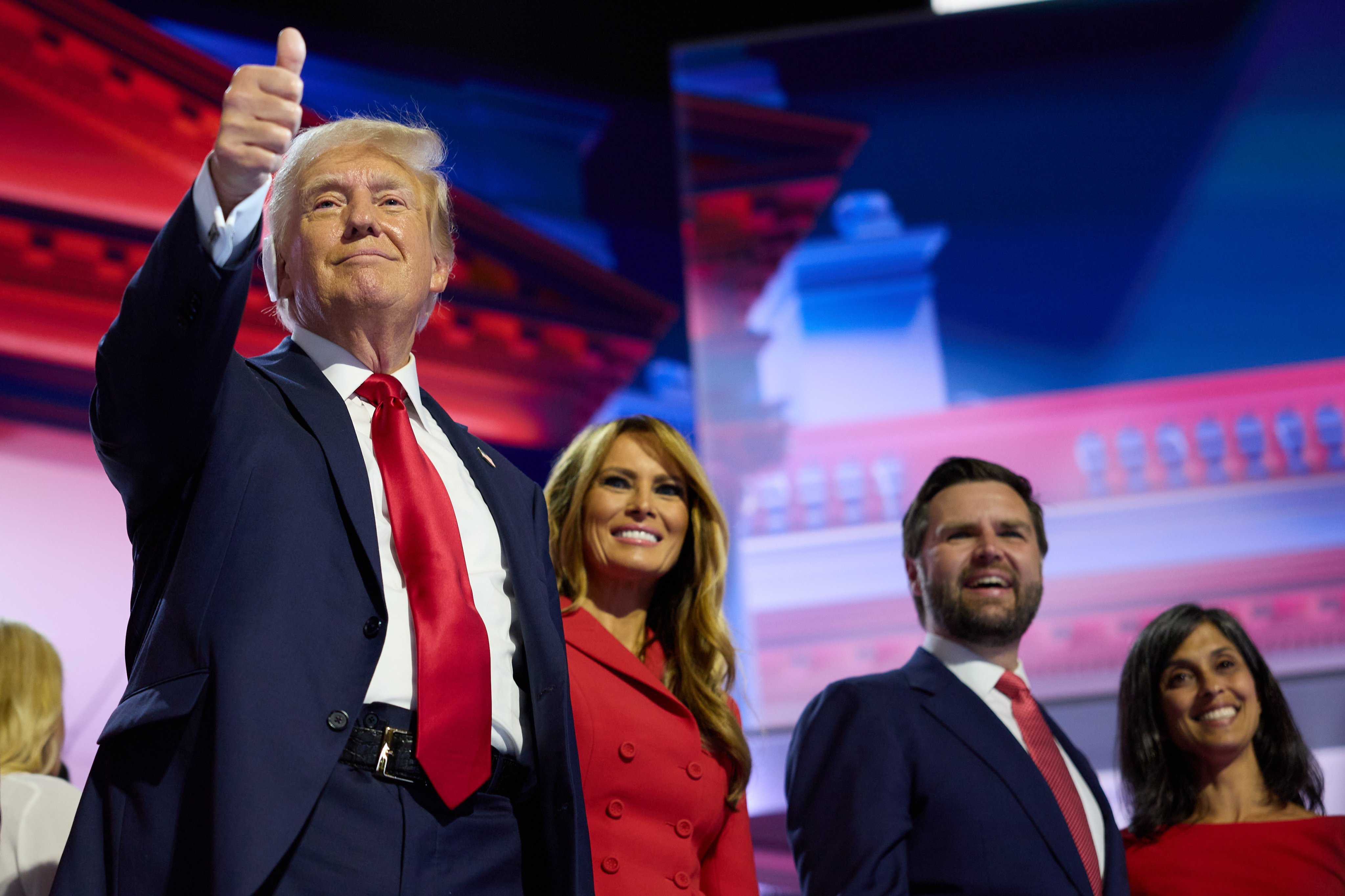 From left, Republican presidential nominee Donald Trump and his wife Melania are joined on stage by his running mate Senator J.D.  Vance and his wife Usha at the end of the Republican National Convention in Milwaukee, Wisconsin, late Thursday night. Photo: EPA-EFE