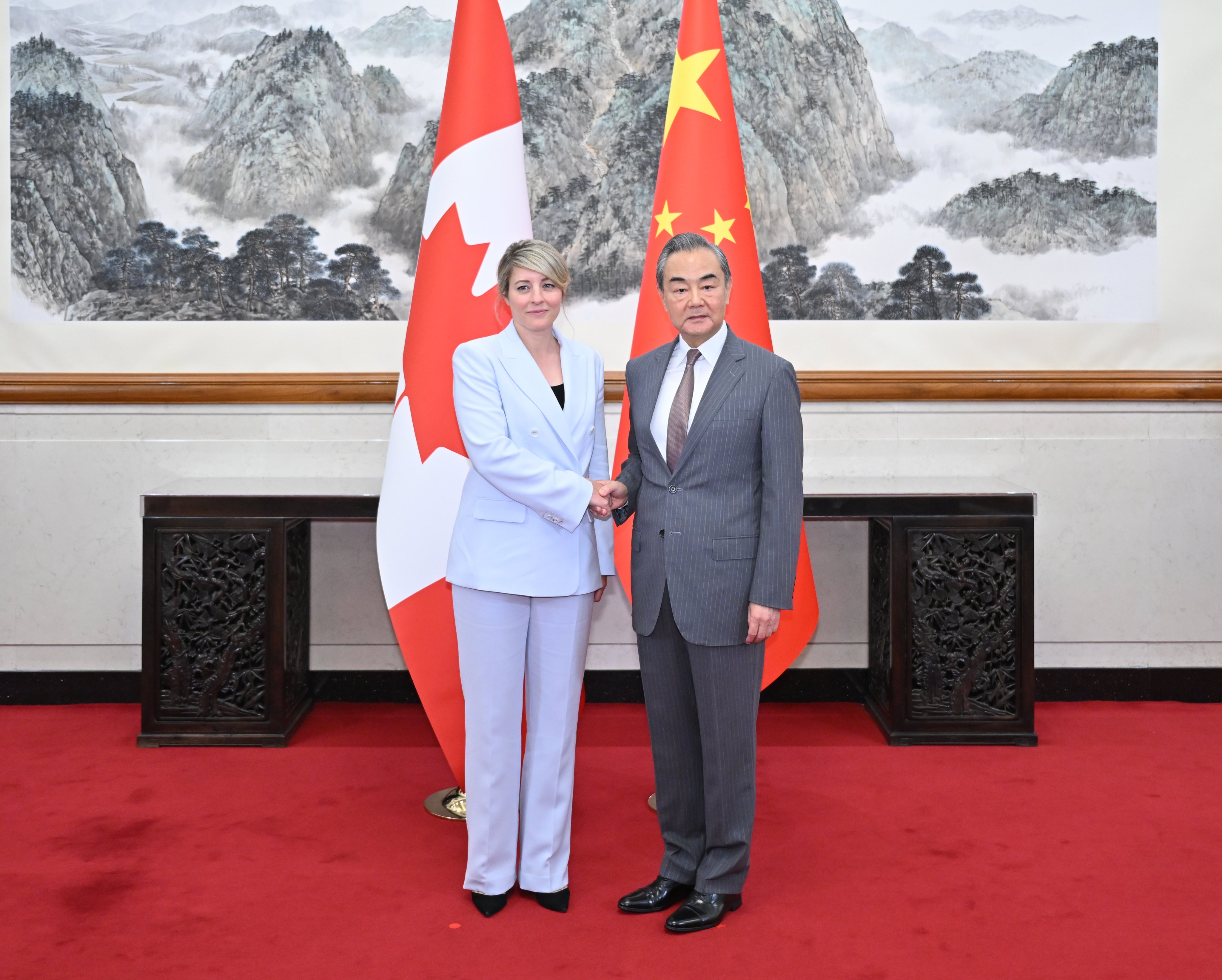 Chinese Foreign Minister Wang Yi with his Canadian counterpart  Melanie Joly in Beijing on Friday. Photo: Xinhua