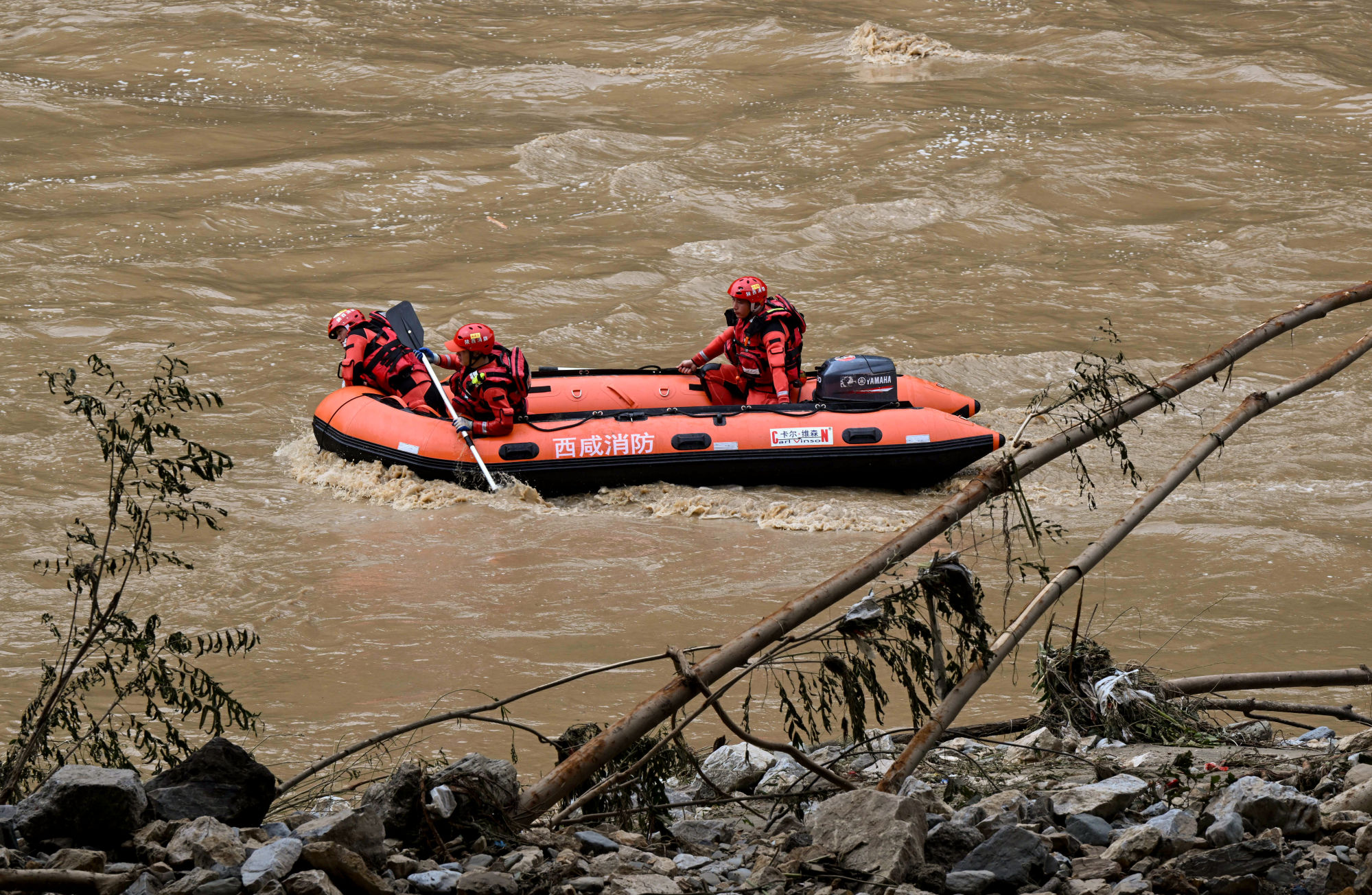 Rescue teams at the scene near Shangluo city, in northwest China’s Shaanxi province on Saturday. Photo: Xinhua