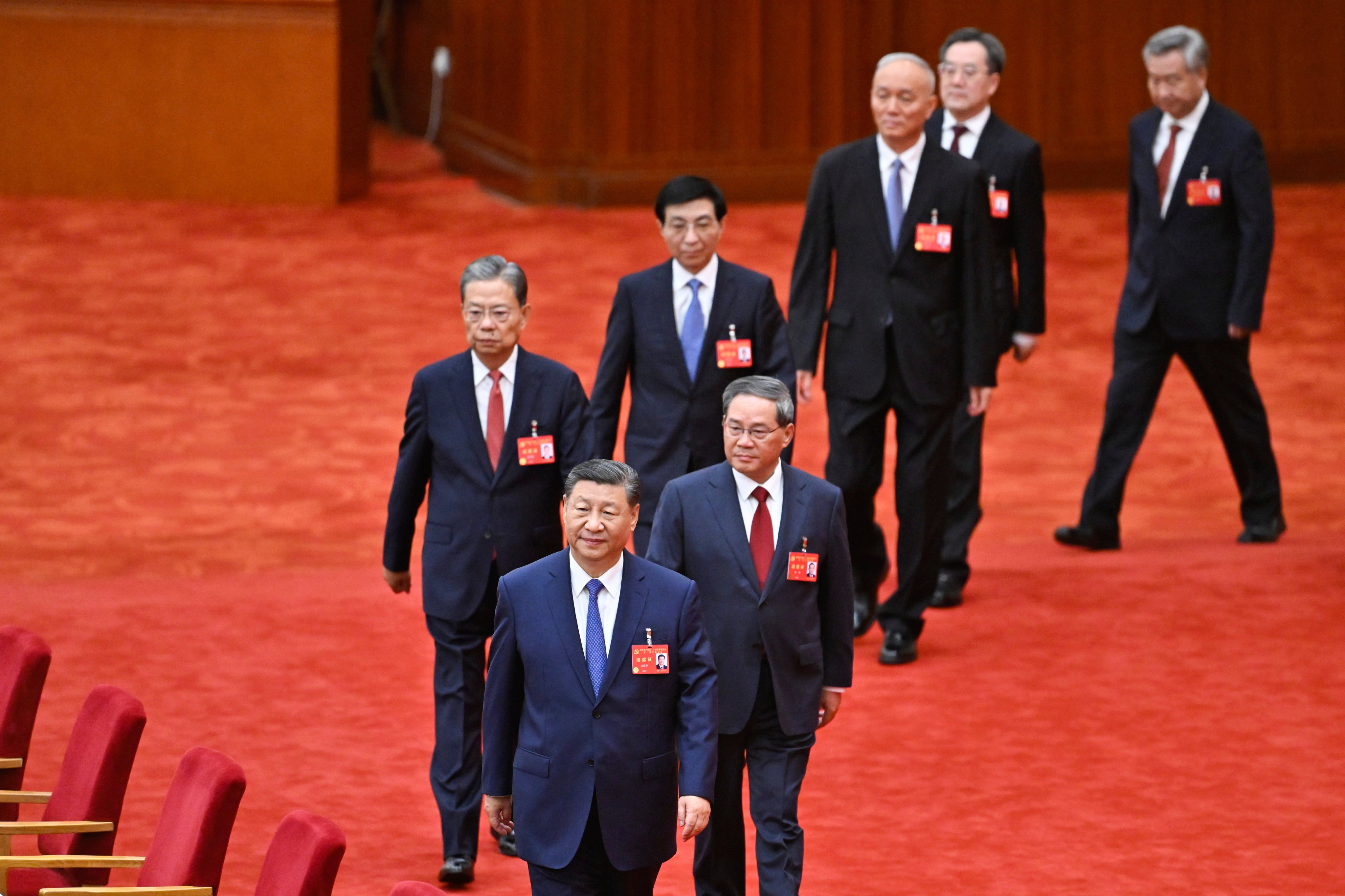 Members of the Politburo Standing Committee (from front) Xi Jinping, Li Qiang, Zhao Leji, Wang Huning, Cai Qi, Ding Xuexiang and Li Xi attend the third plenary session of the 20th Communist Party of China Central Committee in Beijing. Photo: AP