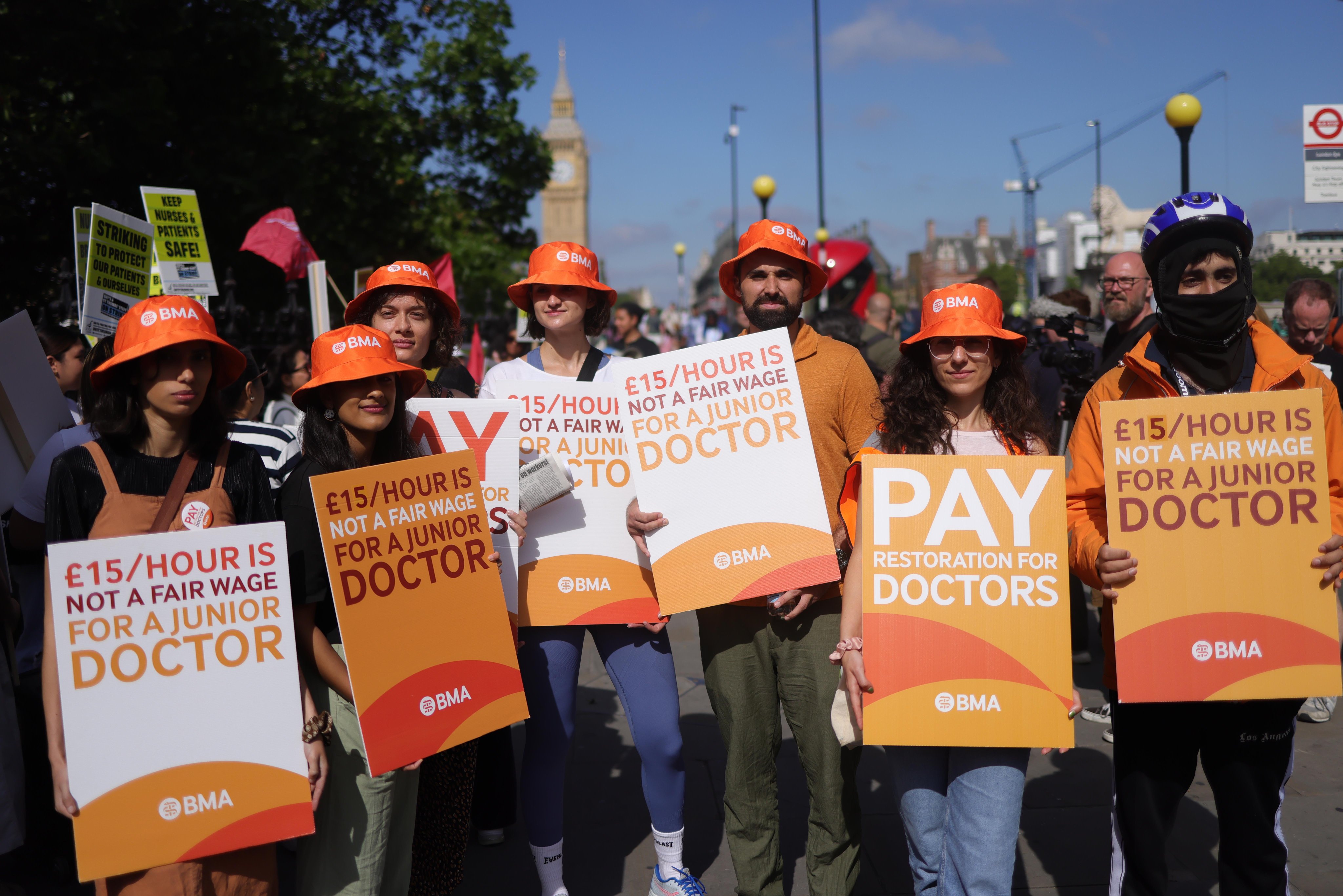 Junior doctors picket outside Guys and St Thomas Hospital in London, Britain, in June, during a strike in a long-running dispute over pay and conditions. Photo: EPA-EFE