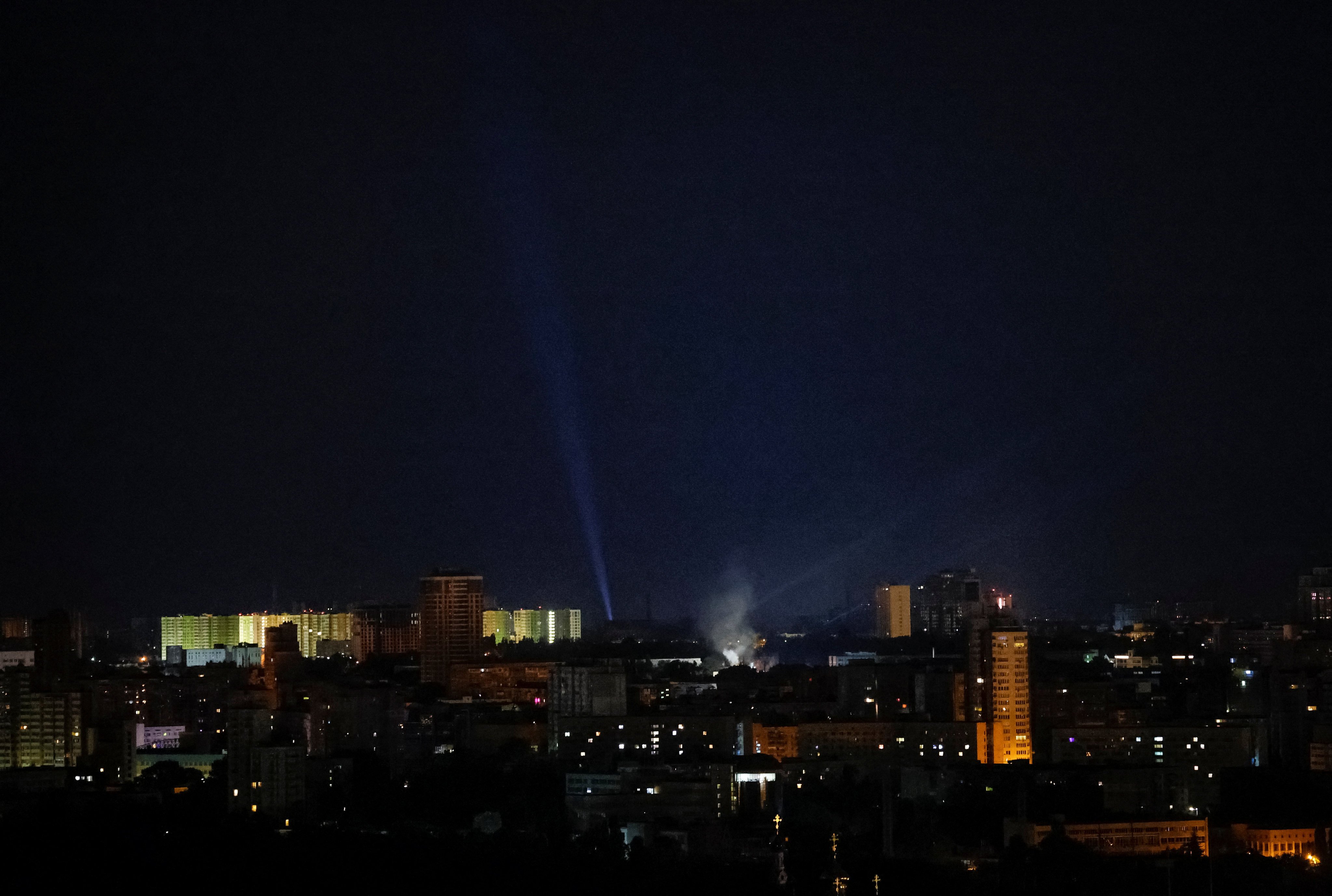 Ukrainian servicemen use searchlights as they look for drones in the sky over the city during a Russian drone strike, amid Russia’s attack on Ukraine, in Kyiv, Ukraine, on Sunday. Photo: Reuters
