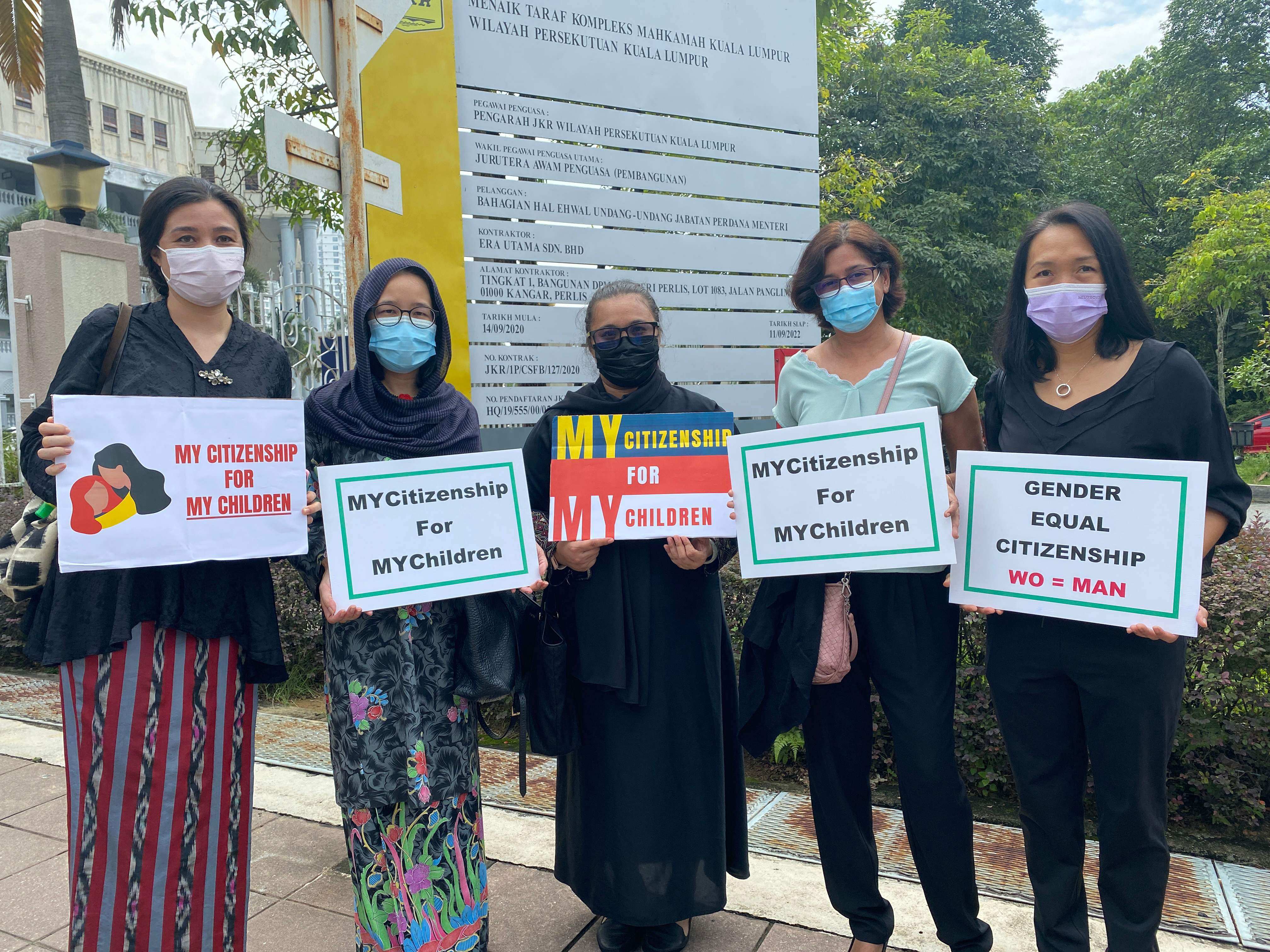 Plaintiffs in a case challenging a Malaysian law preventing women passing citizenship onto children born overseas, pictured outside court in 2021. Photo: Family Frontiers / Handout via AFP