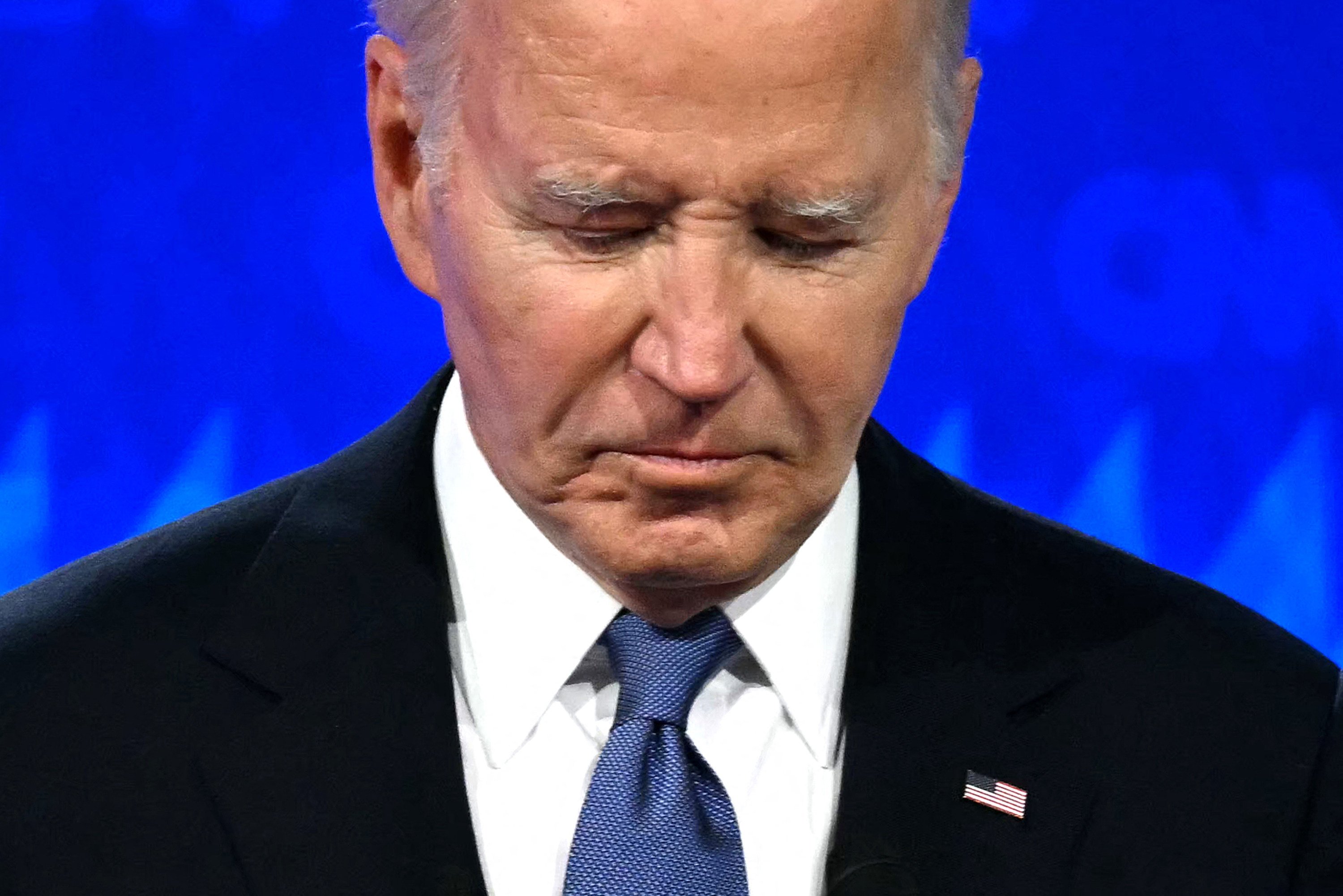 US President Joe Biden looks down as he takes part in a debate with former president Donald Trump in Atlanta, Georgia, on June 27, 2024. Photo: AFP/Getty Images/TNS