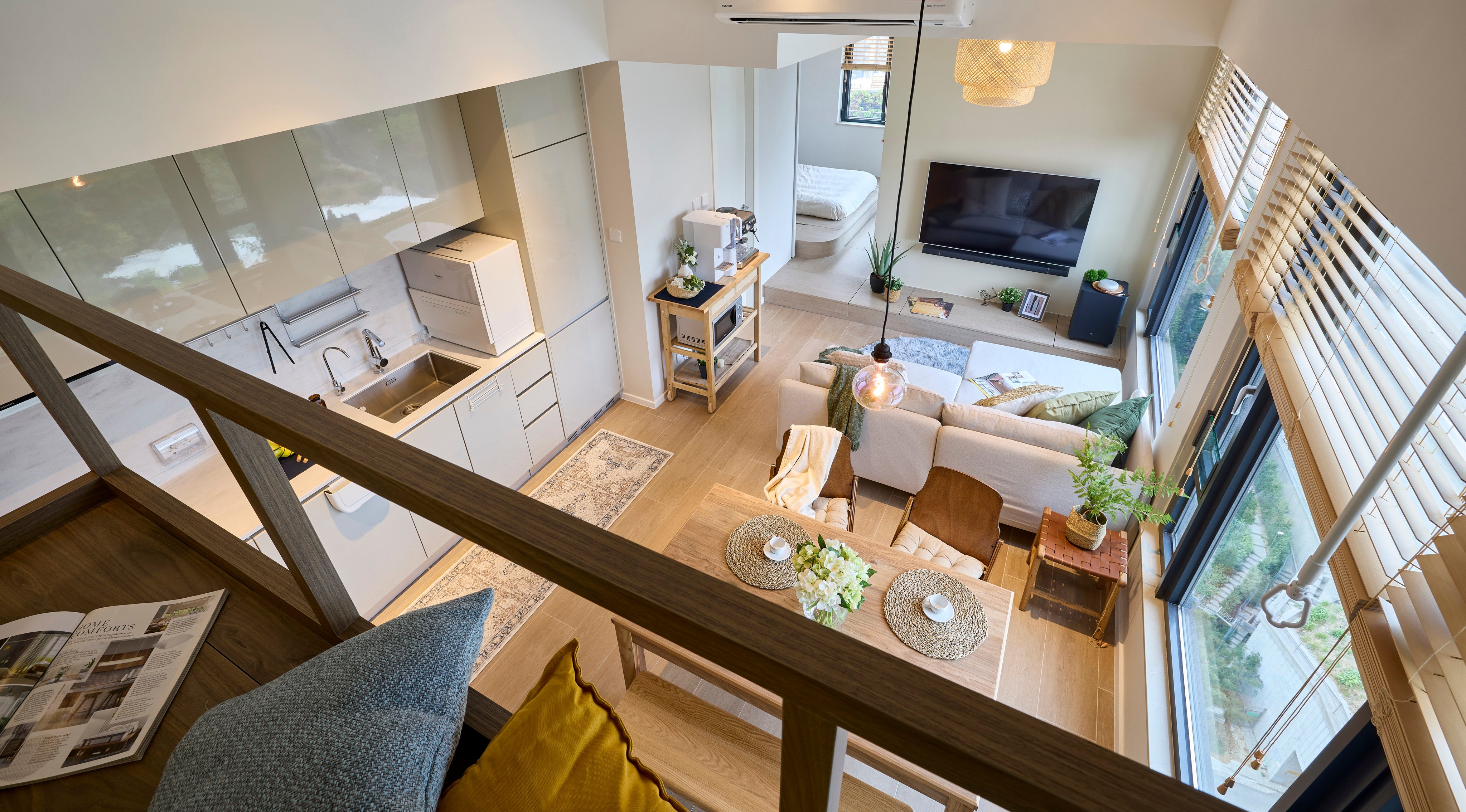 The view of this Tuen Mun flat from its platform hang-out area. The space was designed by LittleMORE. Photography: Michael Perini