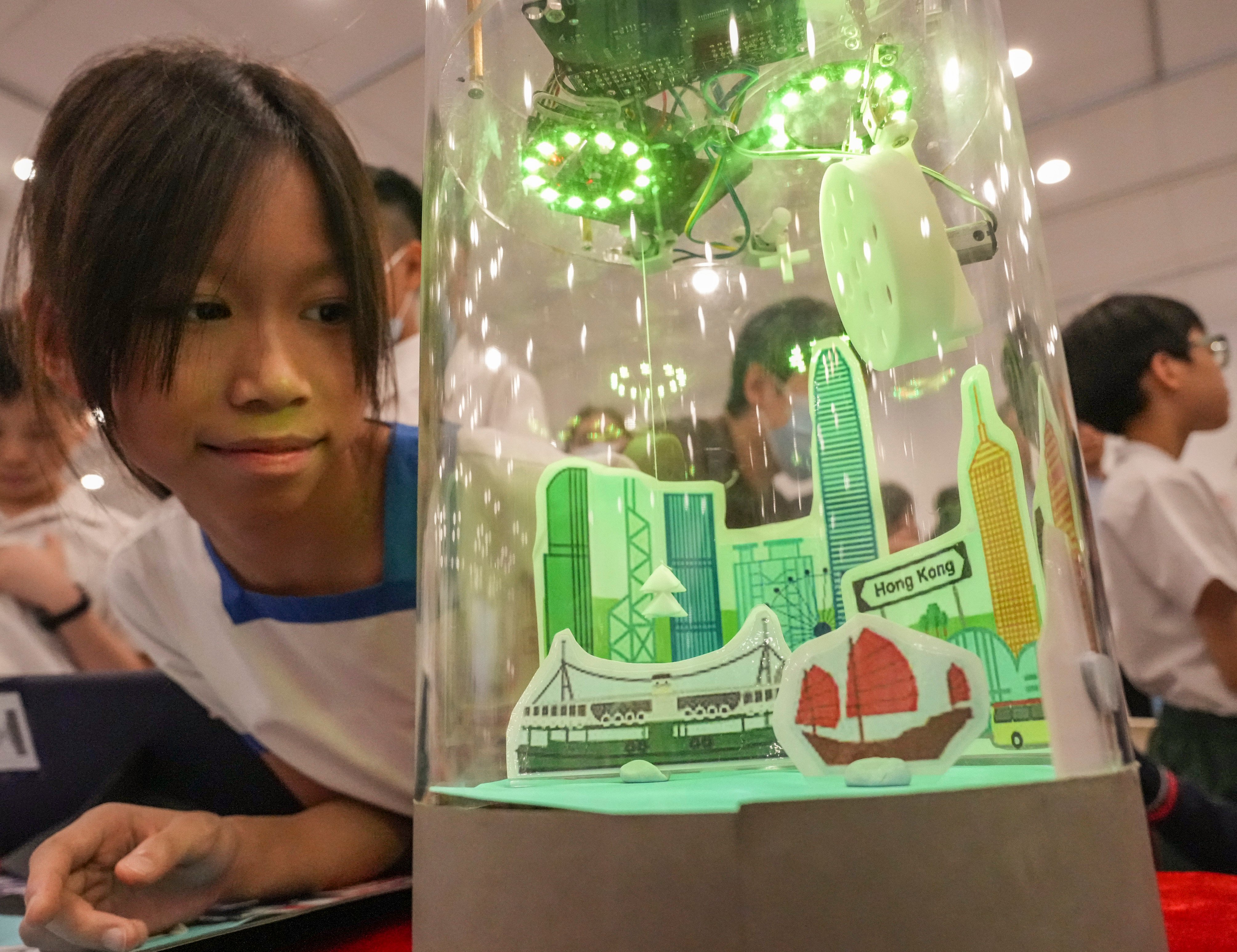 Students showcase their creations at the 26th Primary STEAM Project Exhibition, themed around climate change, at the Hong Kong Central Library Exhibition Gallery in Causeway Bay on May 8. Photo: May Tse