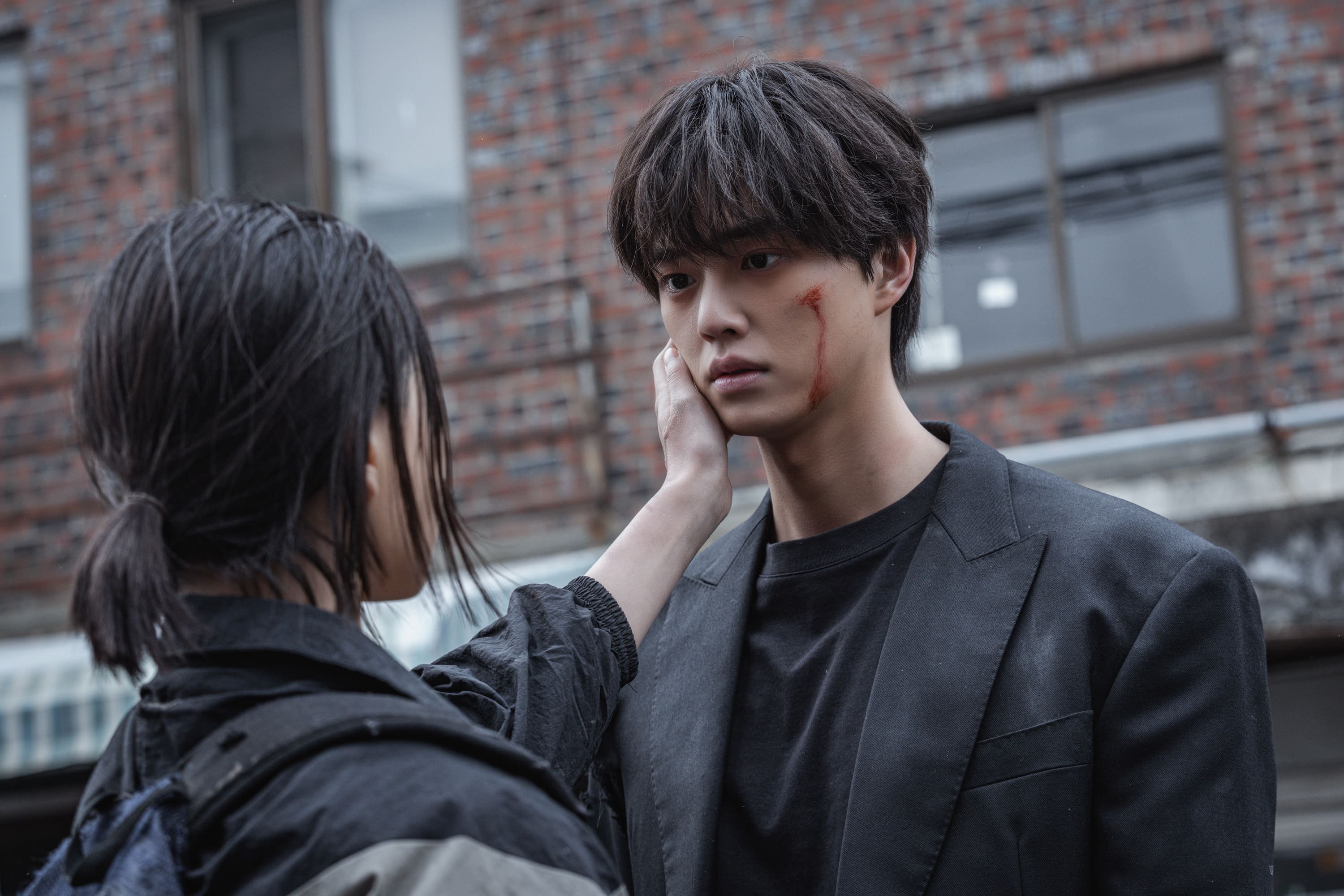 Go Min-si as Lee Eun-yu (left) and Song Kang in a still from Sweet Home season 3. Photo: Netflix