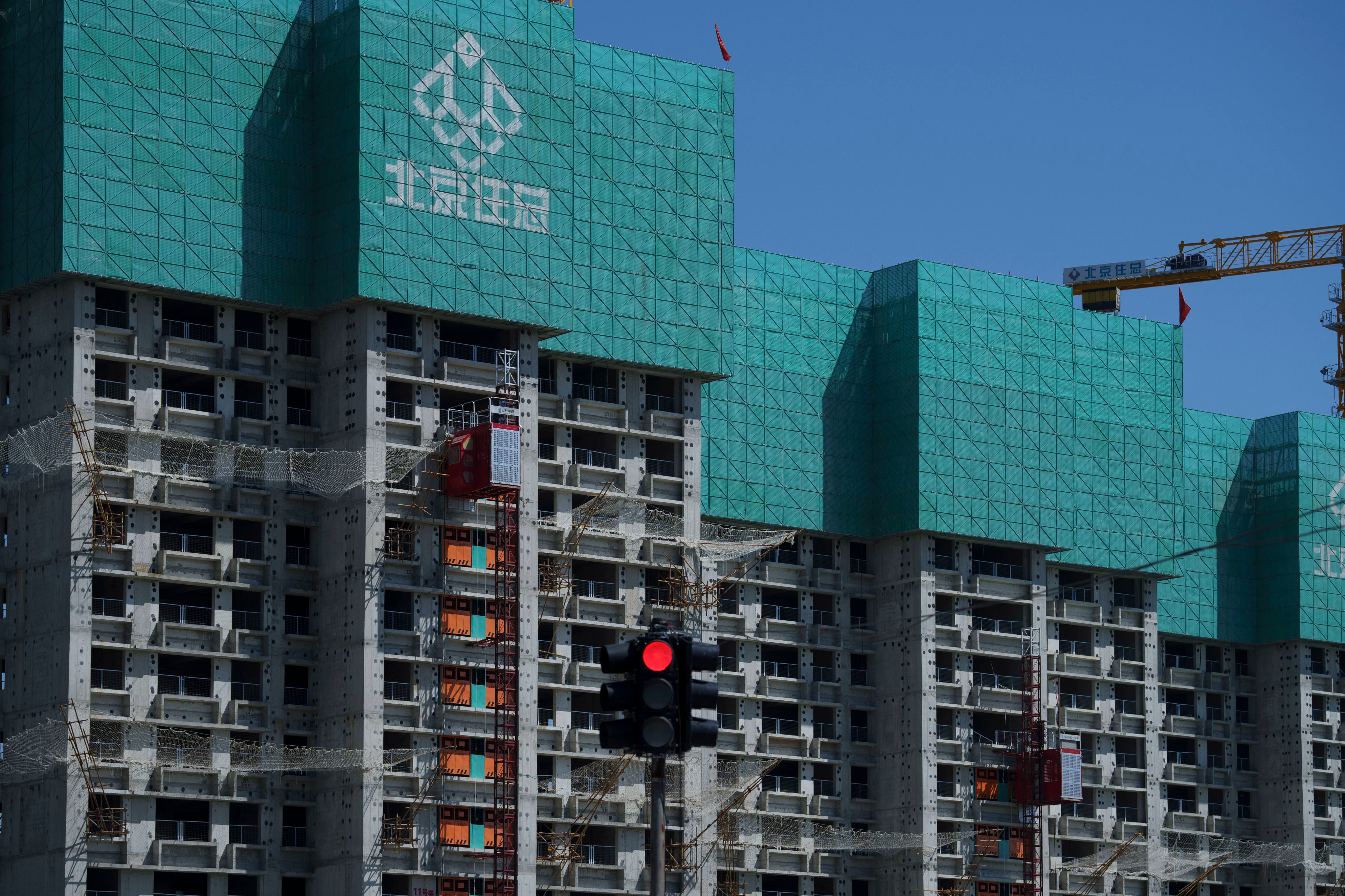 The Beijing-based National Institute for Finance and Development warned that China’s beleaguered property sector is having a major drag on household borrowing and consumption. Photo: AP
