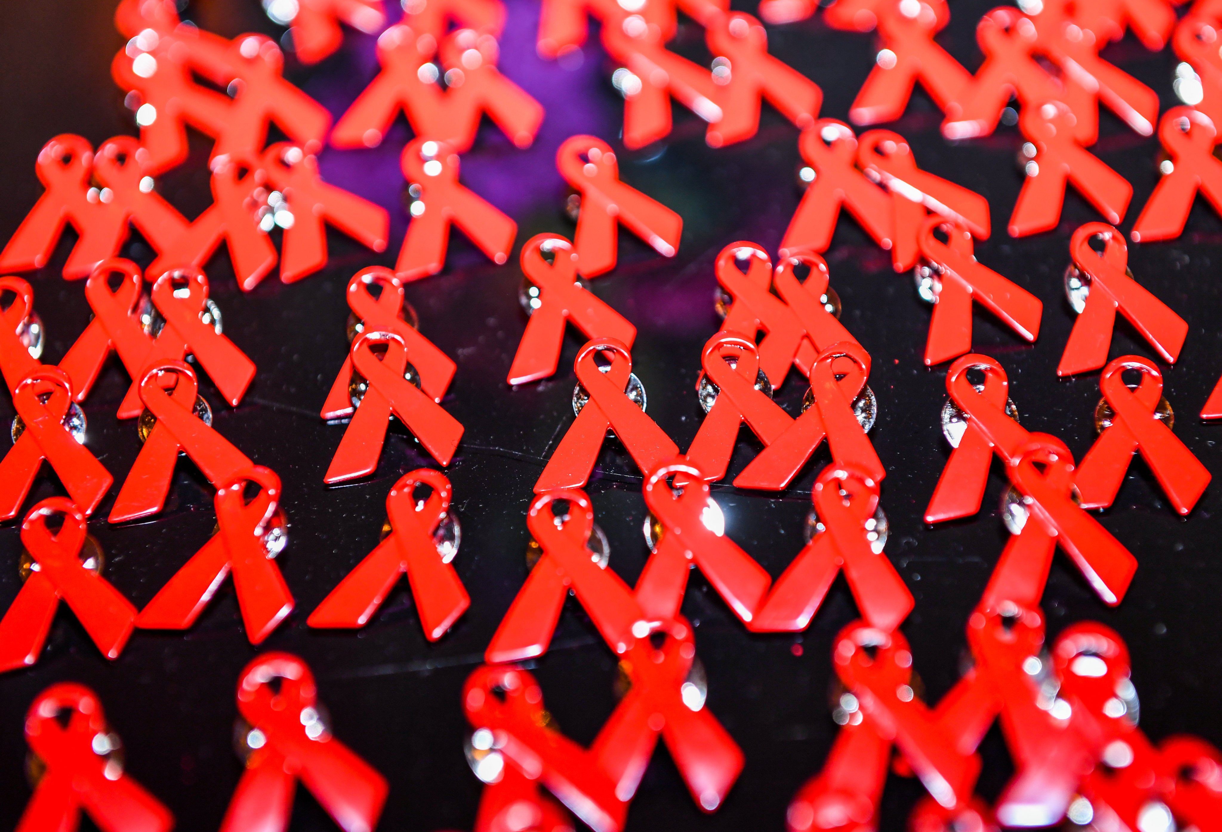 The red ribbon is a universal symbol of awareness and support for people living with HIV. Photo: dpa