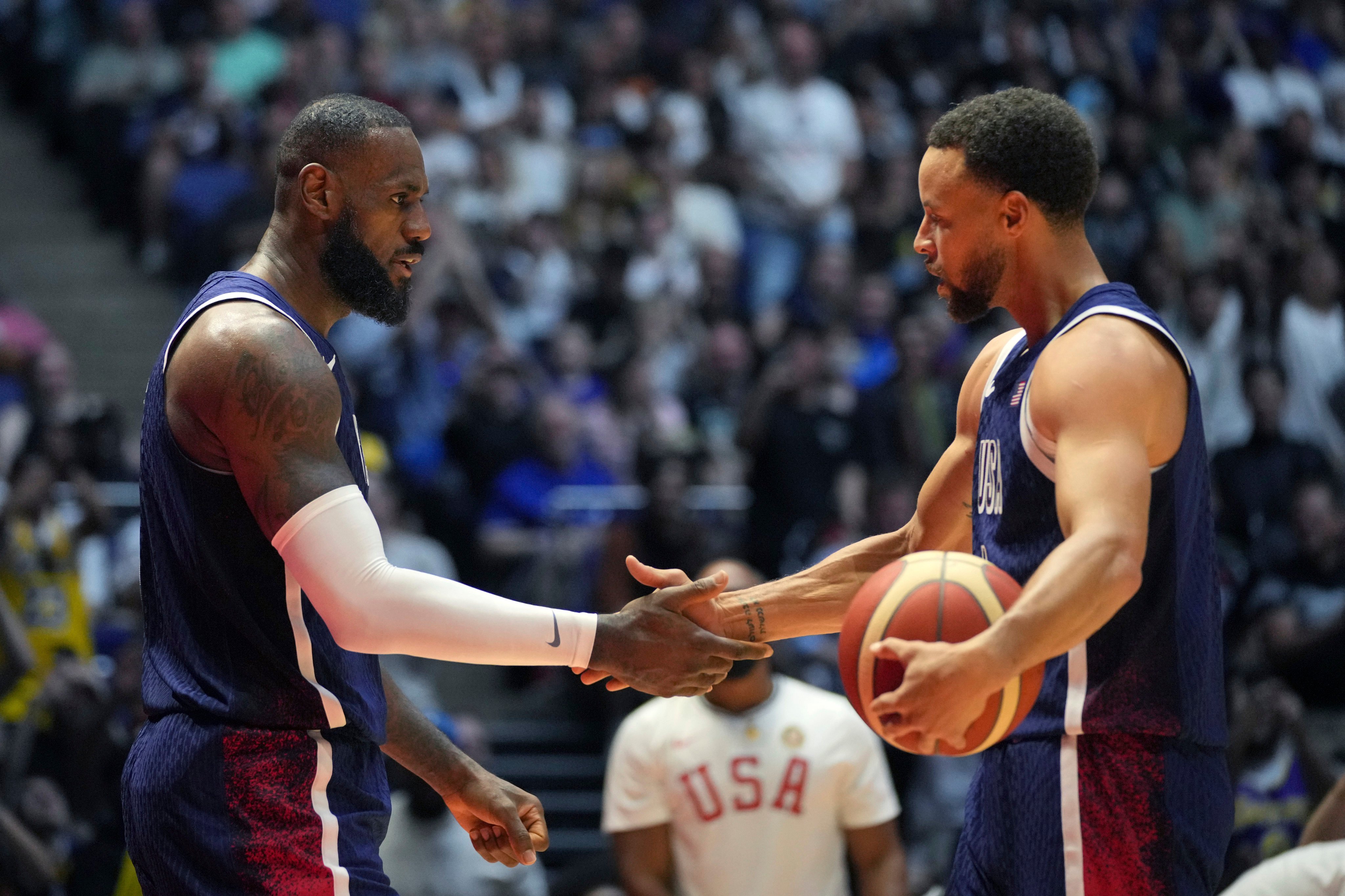 Steph Curry (right) will be making his Olympic debut playing alongside LeBron James (left) for Team USA basketball in Paris. Photo: AP