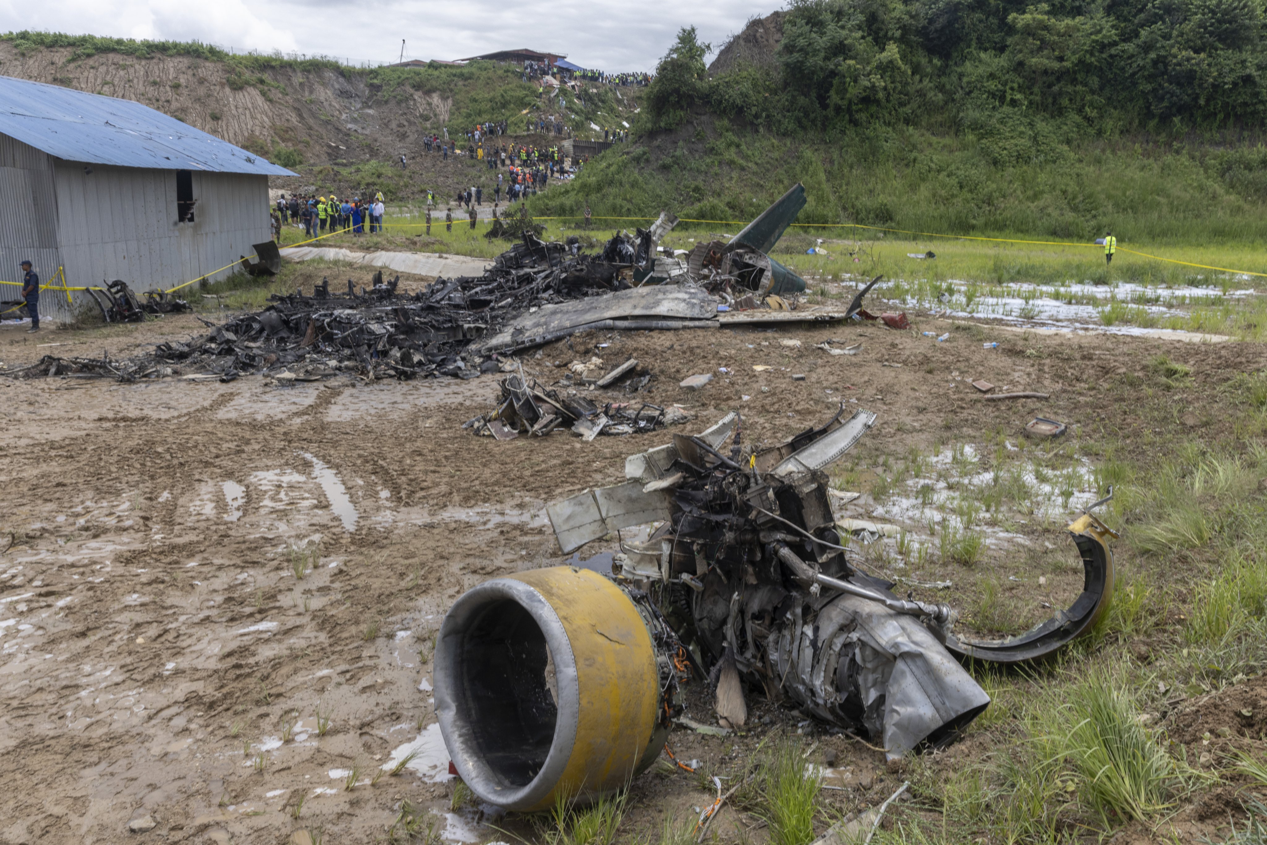 The bodies of 18 people were recovered while one injured person was taken to hospital after a plane crash in Nepal. Photo:  EPA-EFE