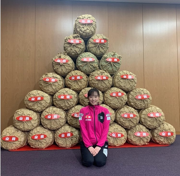 Japan’s Kasumi Ishikawa with bags of rice. Photo: Instagram/kasumi.ishikawa_official