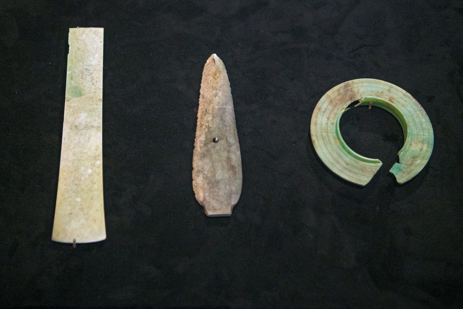 The latest artefacts discovered at the Sanxingdui site include pieces of finished and raw jade, as well as stone scraps and fragments, representing various stages of the production process. Photo: Xinhua