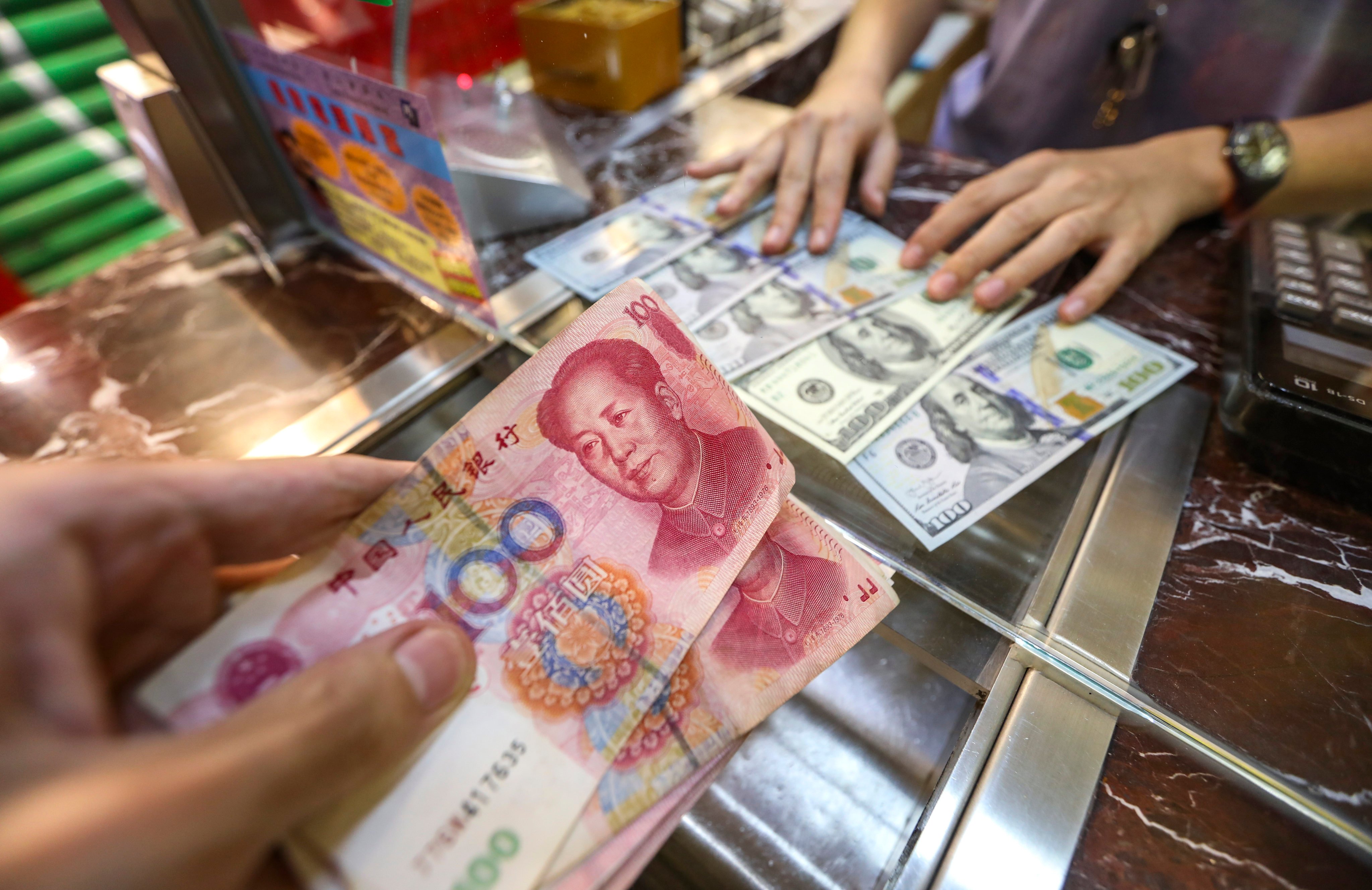 China, which keeps a tight grip on cross-border capital flow, maintains an annual quota on foreign debt by domestic companies. Photo: Roy Issa