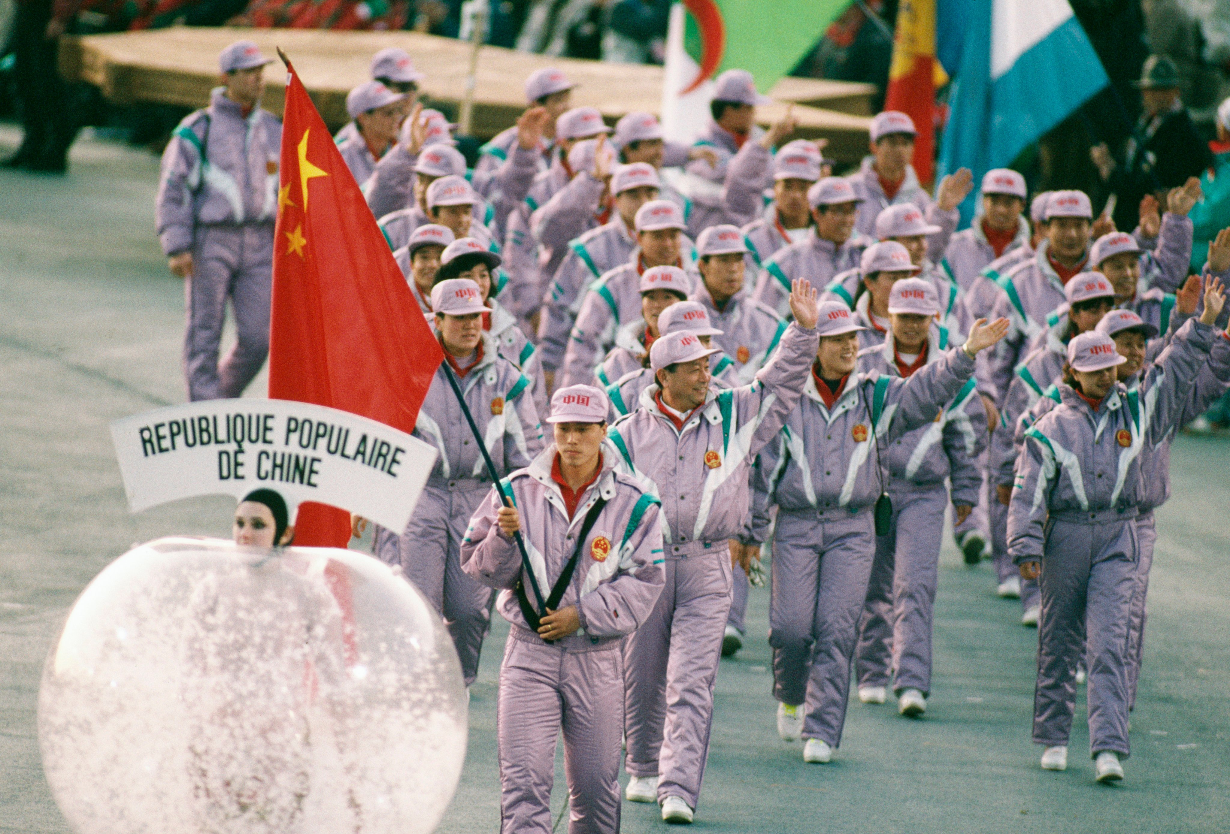 Team China was far ahead of the curve by making waves with their lilac athletic cotton jackets at the 1992 Winter Olympics in Albertville, France. Photo: Getty Images