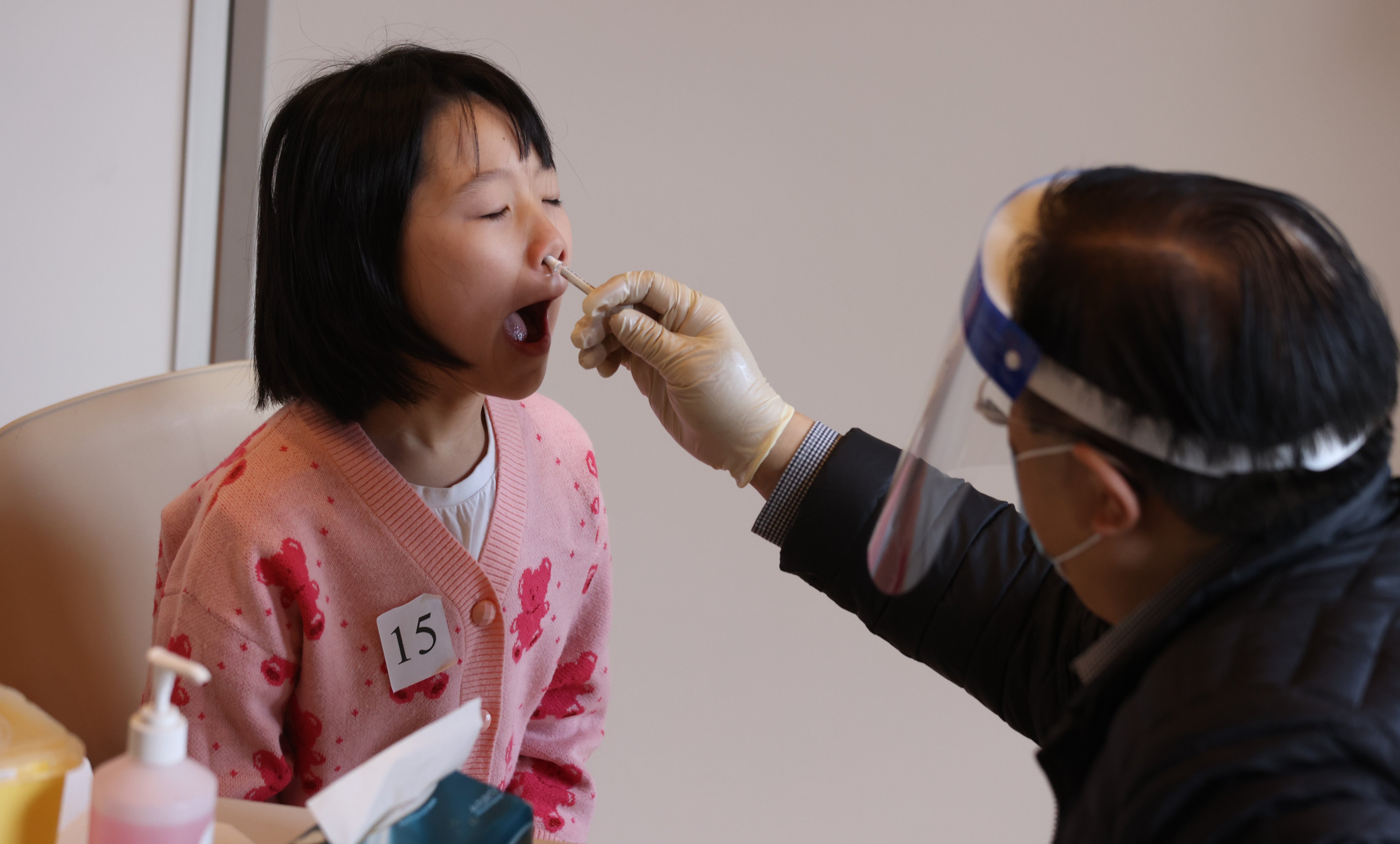 A young girl gets a nasal spray flu vaccine instead of a jab earlier this year. Photo: Yik Yeung-man