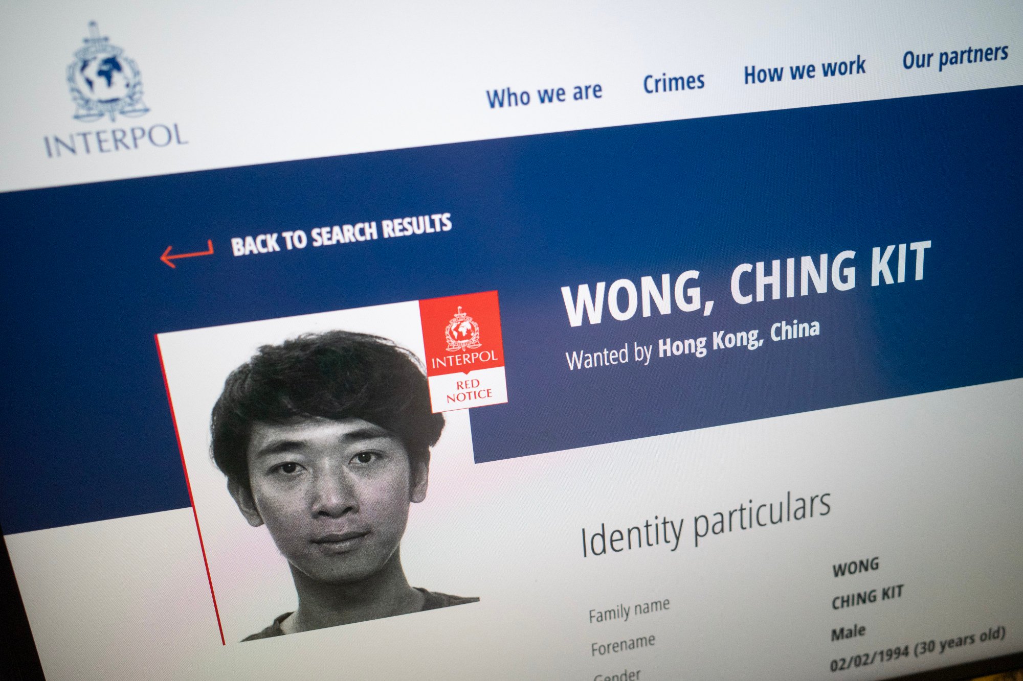 An Interpol red notice for Wong Ching-kit, a young cryptocurrency promoter. Photo: SCMP