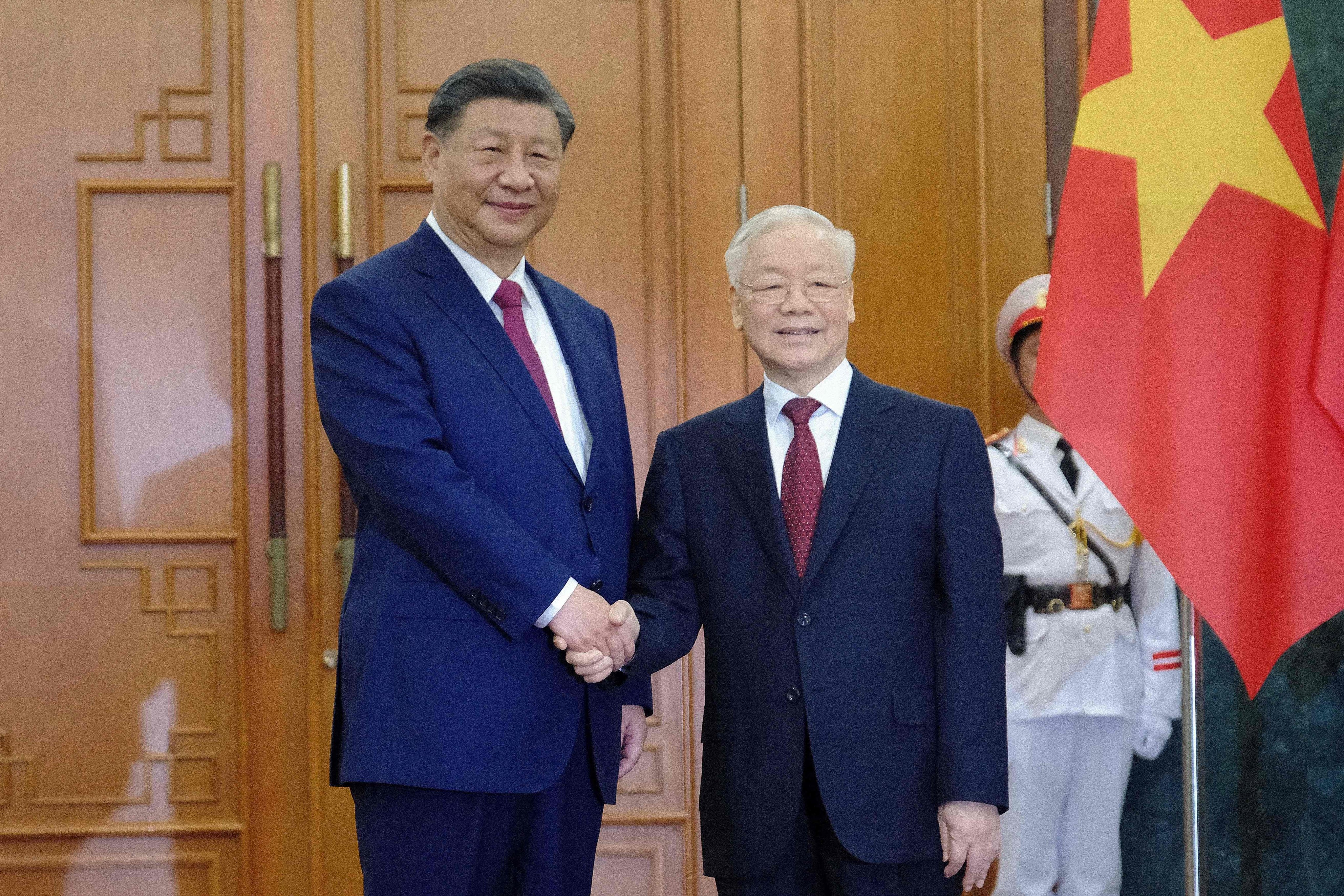 Chinese President Xi Jinping (left) said he had a “deep camaraderie” with Nguyen Phu Trong. Long-serving Vietnamese leader Trong died on July 19 at 80 “after a period of illness”, state media said. Photo: AFP