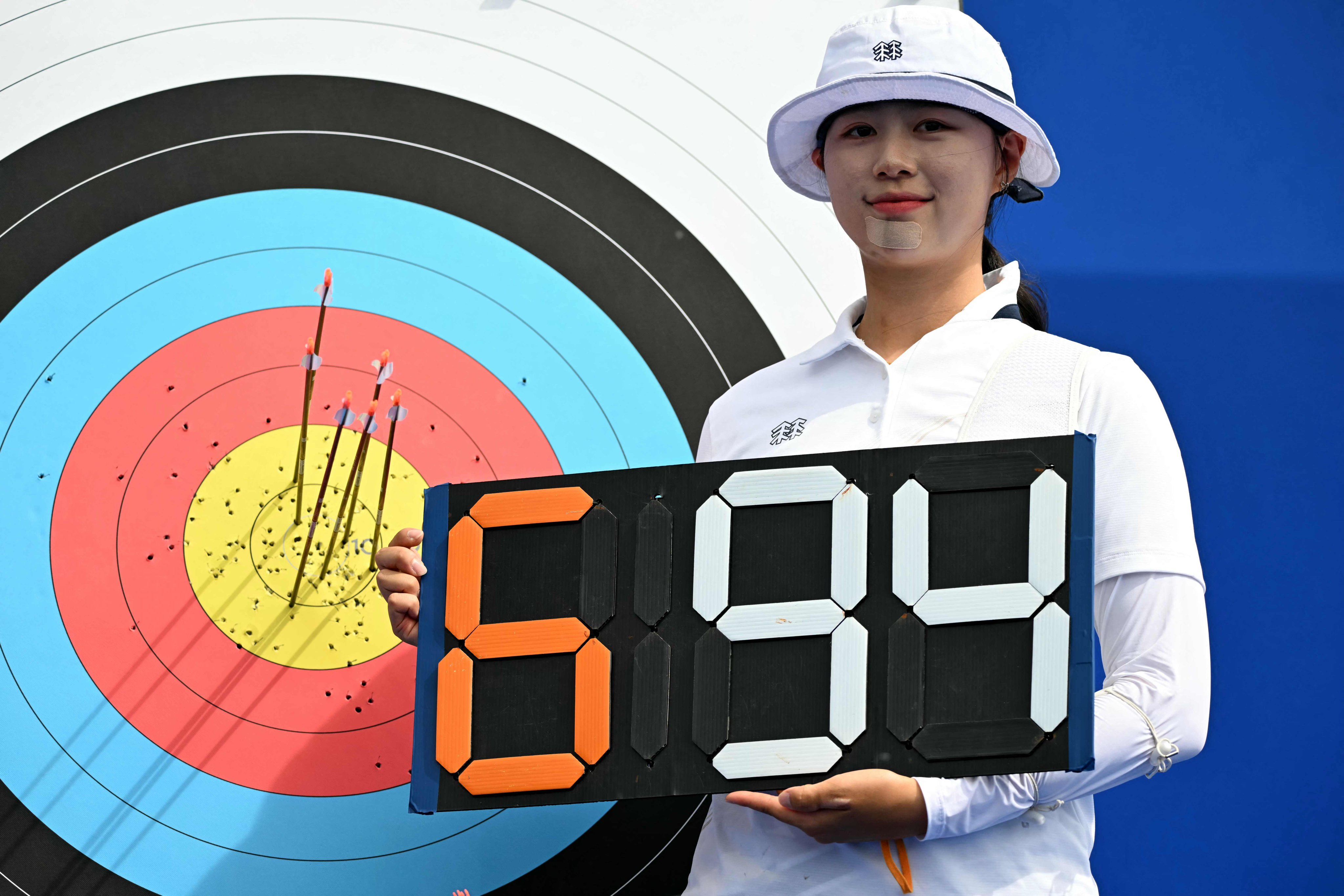 South Korea’s Lim Si-hyeon poses after the women’s individual preliminary round at the Esplanade des Invalides. Photo: AFP