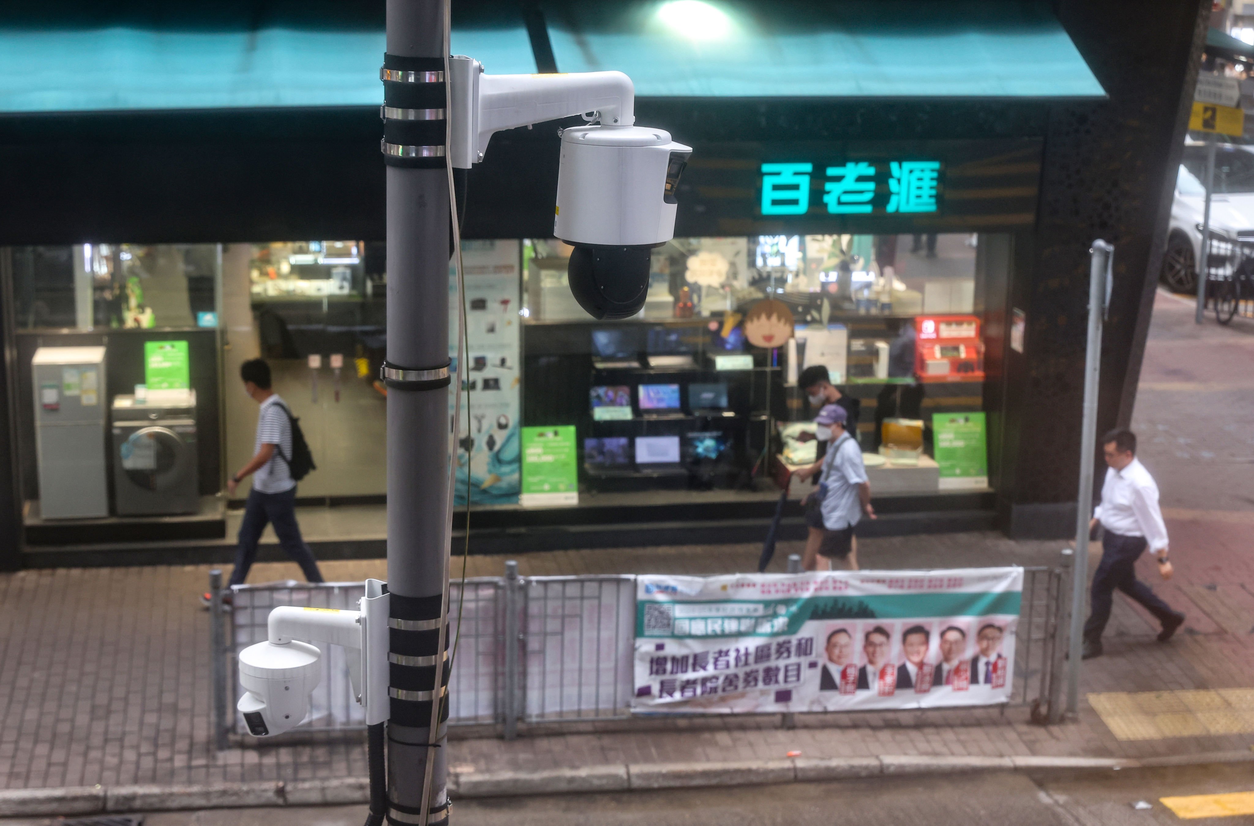 An eye-in-the sky CCTV camera monitors Mong Kok. Photo: Edmond So