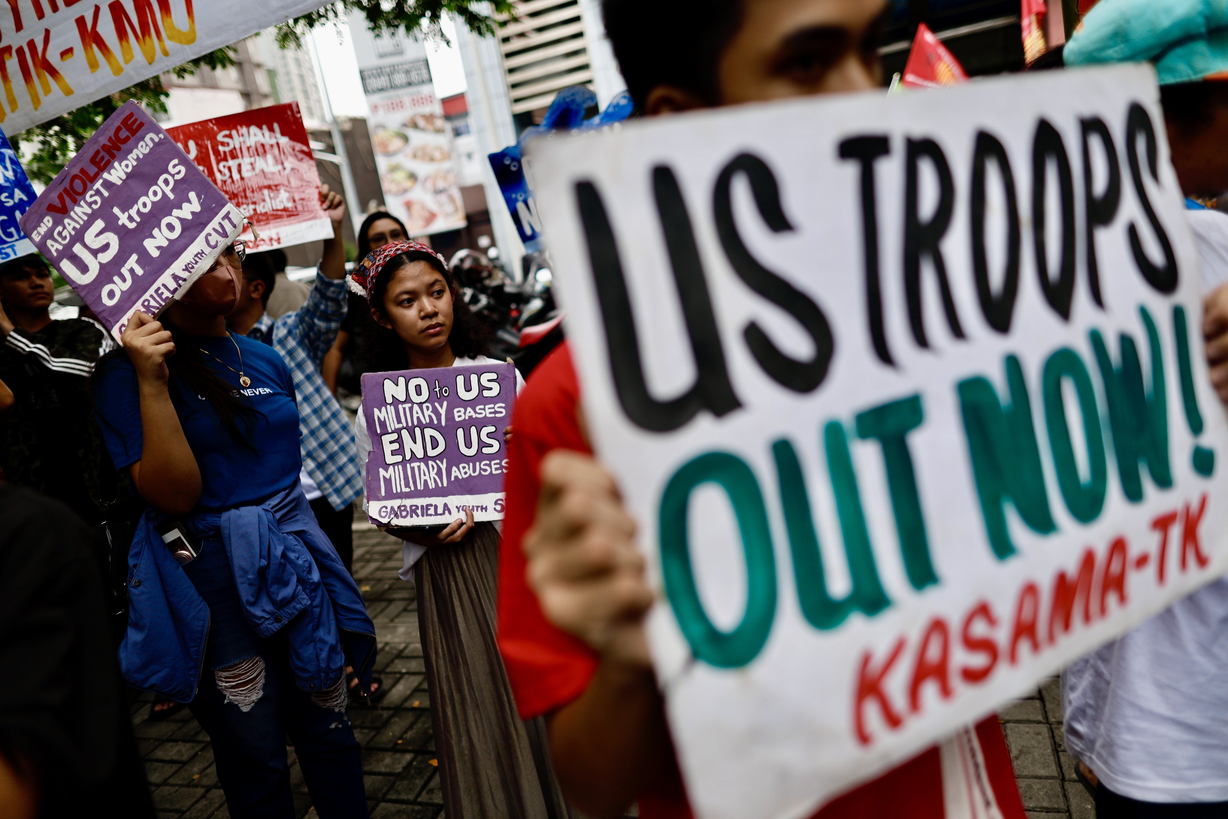 Protesters hold a rally in Manila on July 18 against the US military presence in the Philippines. Photo: EPA-EFE