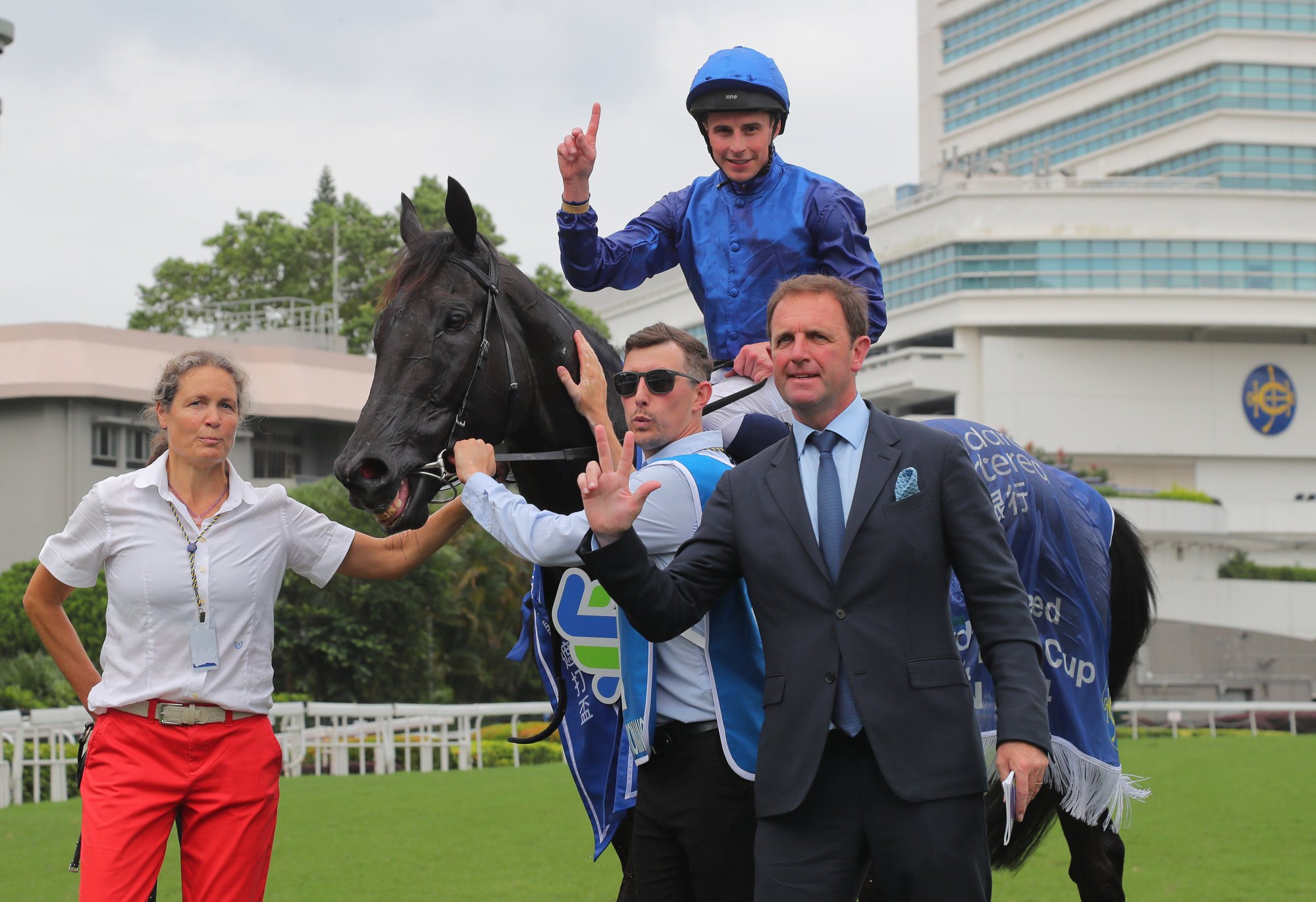 Charlie Appleby (right) and jockey William Buick with Rebel’s Romance after his Champions & Chater Cup victory.