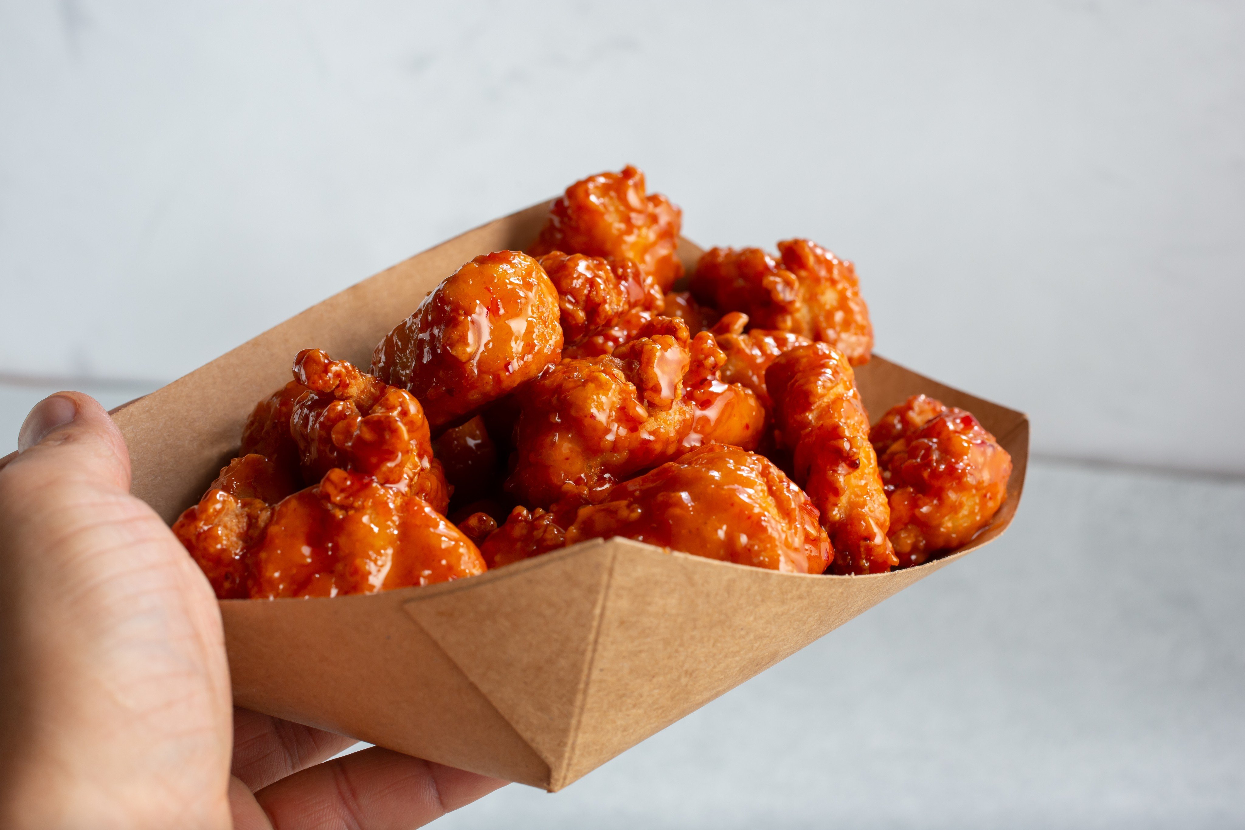 So-called “boneless chicken wings” are actually nuggets of boneless, skinless breast meat. Photo: Shutterstock