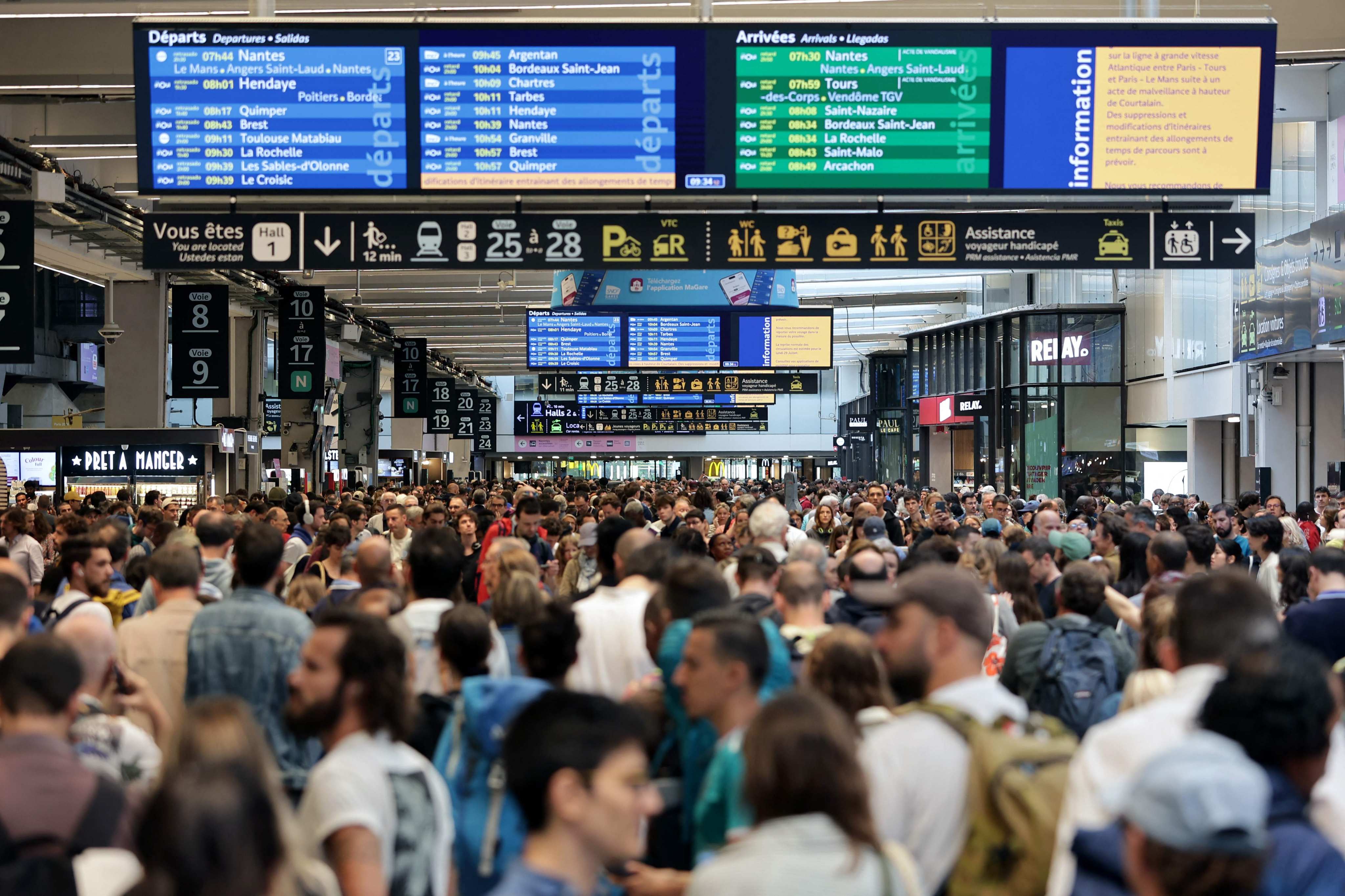 Passengers at the Gare Montparnasse train station in Paris on Friday. Photo: AFP