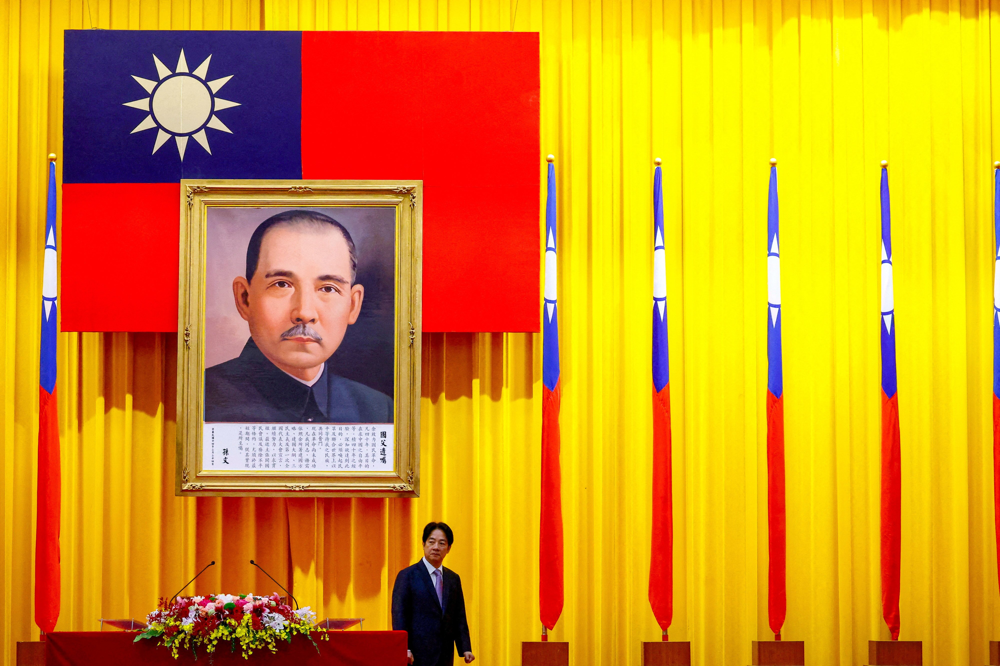 Taiwanese leader William Lai Ching-te stands in front of a portrait of Sun Yat-sen, founding father of the Republic of China, during a graduation ceremony of military academies in Taipei on Saturday. Photo: Reuters