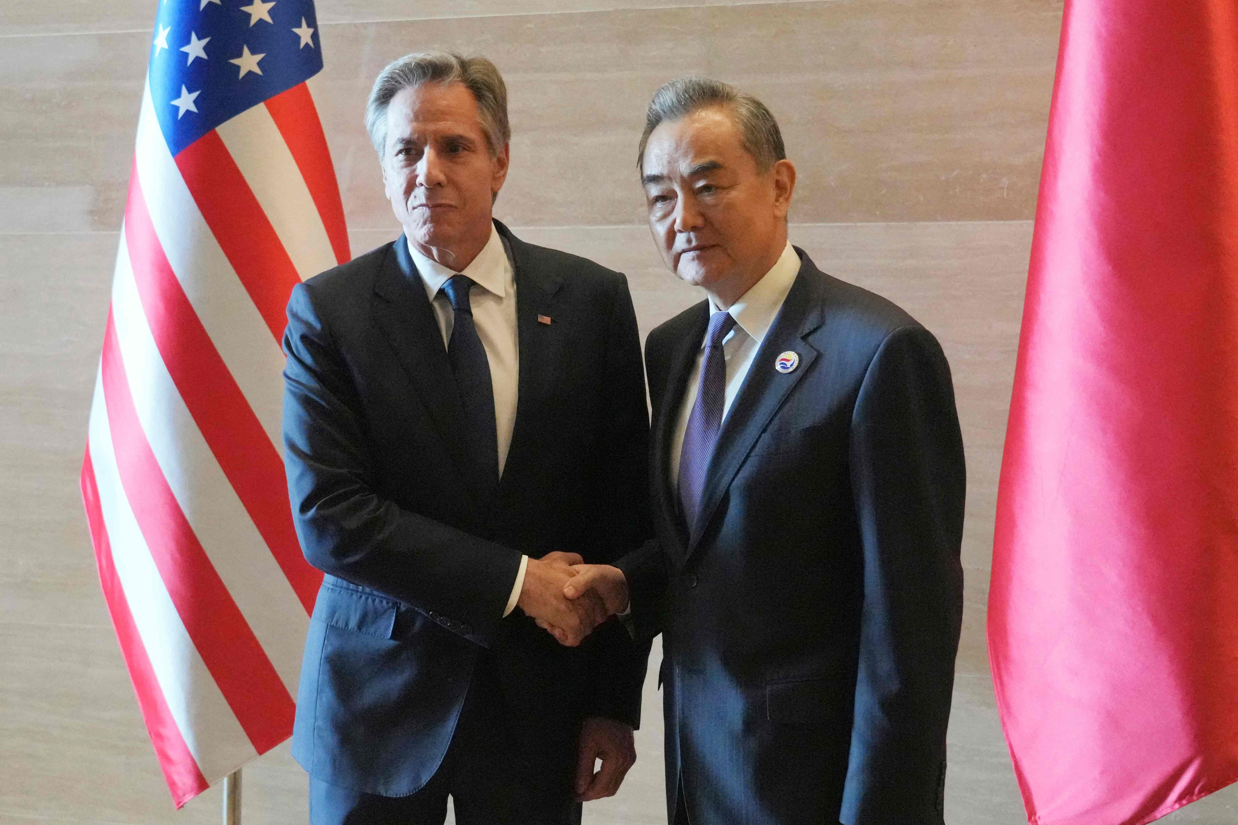 Chinese Foreign Minister Wang Yi and US Secretary of State Antony Blinken meet on the sidelines of the Asean foreign ministers’ meeting in Vientiane on Saturday. Photo: AFP