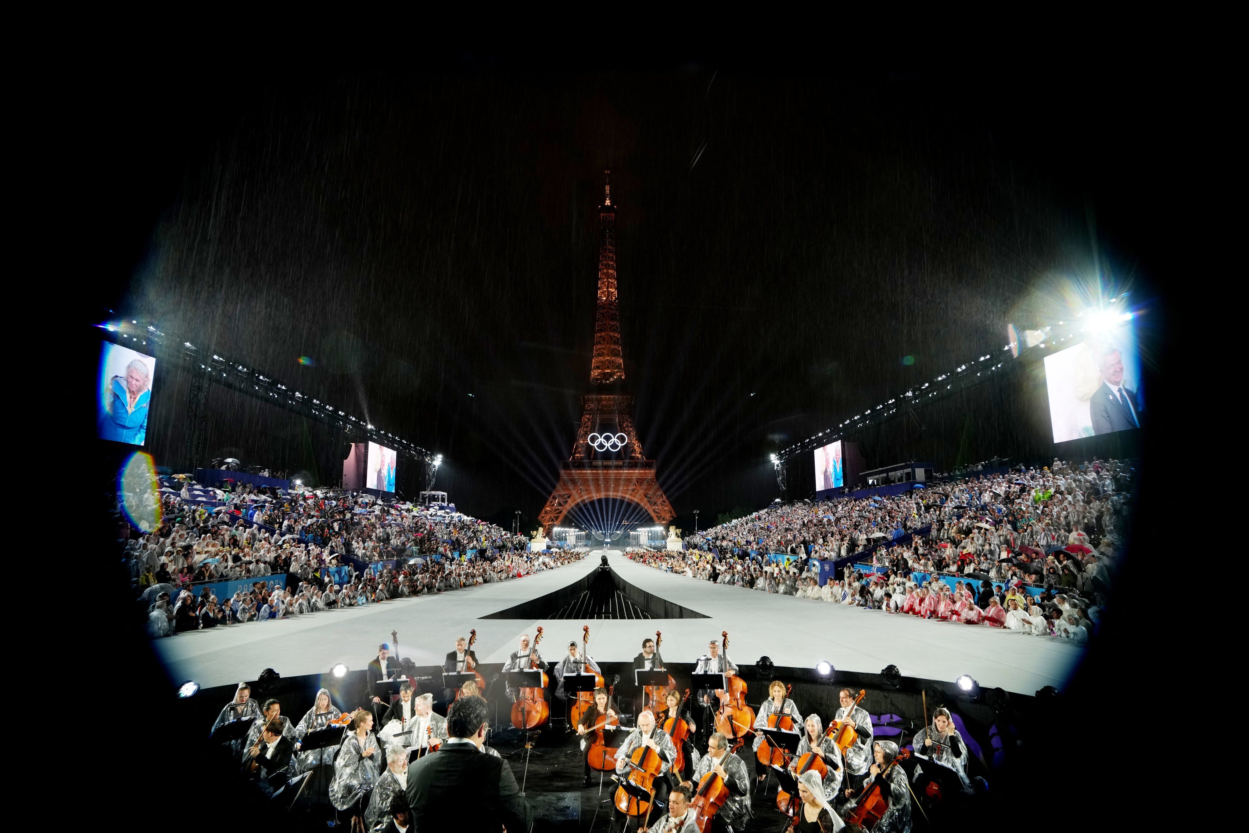 The Eiffel Tower lit up during the Paris 2024 Games opening ceremony, but the event was not to everyone’s liking. Photo: Reuters