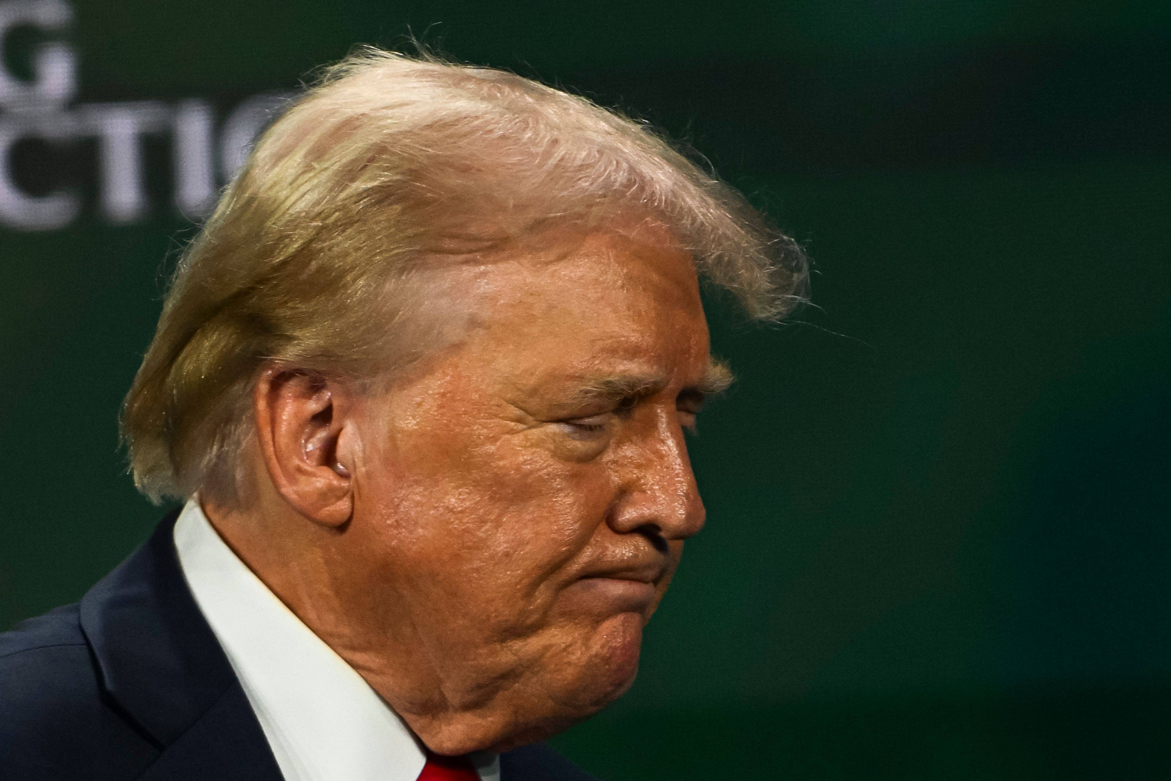 Former US President Donald Trump was seen without a bandage on his ear for the first time since an assassination attempt on July 13. Photo: AFP