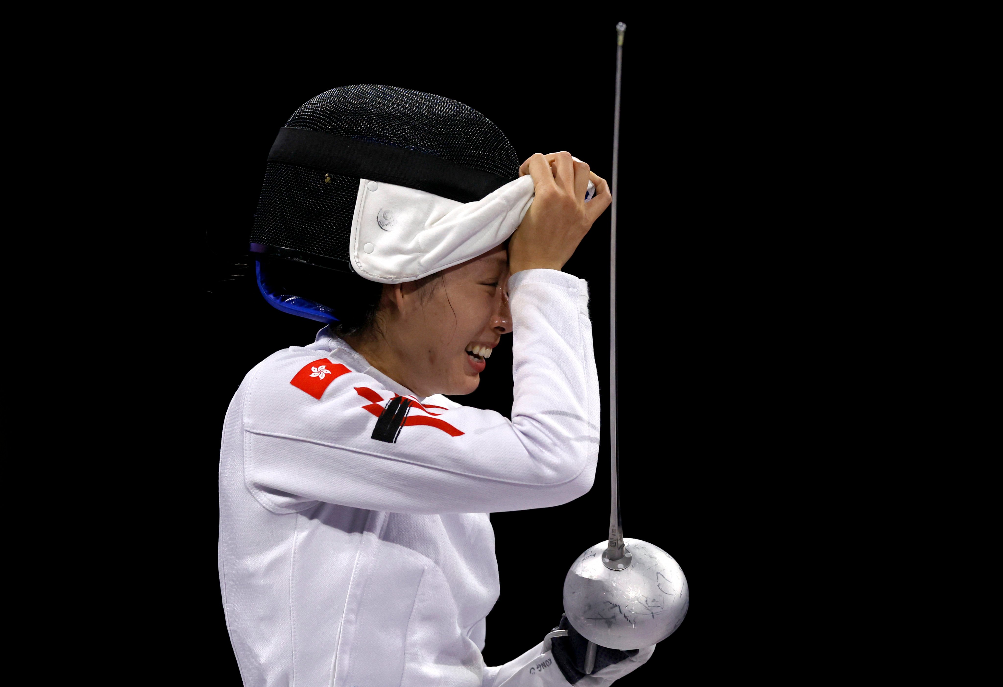 Vivian Kong of Hong Kong clinches the gold medal in the Olympic épée competition. Photo: Reuters