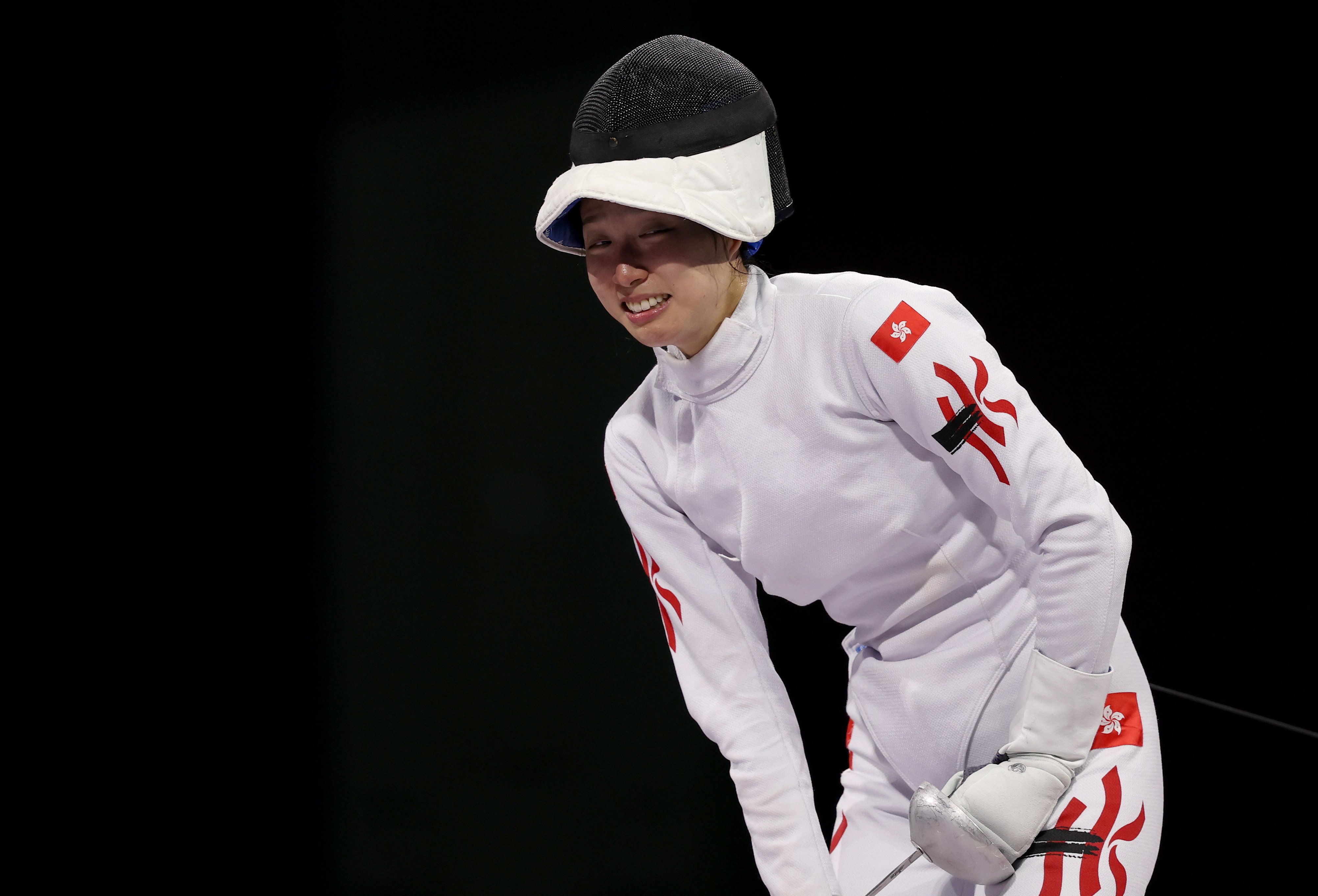 Vivian Kong bursts into tears after after beating Auriane Mallo-Breton of France in the gold medal bout of the women’s individual epee at Paris Olympics. Photo: EPA-EFE