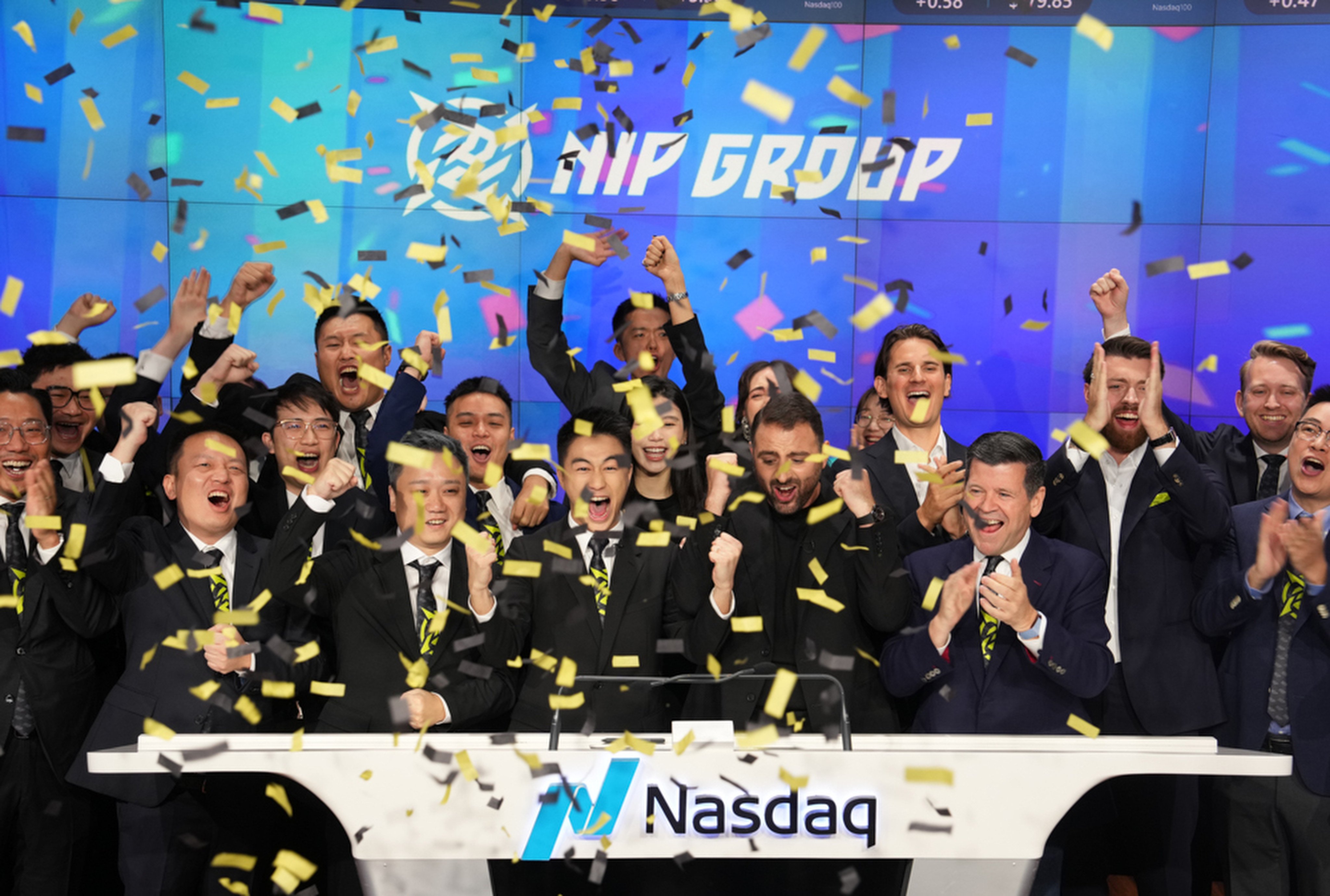 NIP Group chairman Mario Ho Yau-kwan (front row, fourth from left), and his colleagues cheer during the bell-ringing ceremony at the Nasdaq MarketSite in Times Square, New York City, on Friday. Photo: X/ NasdaqExchange