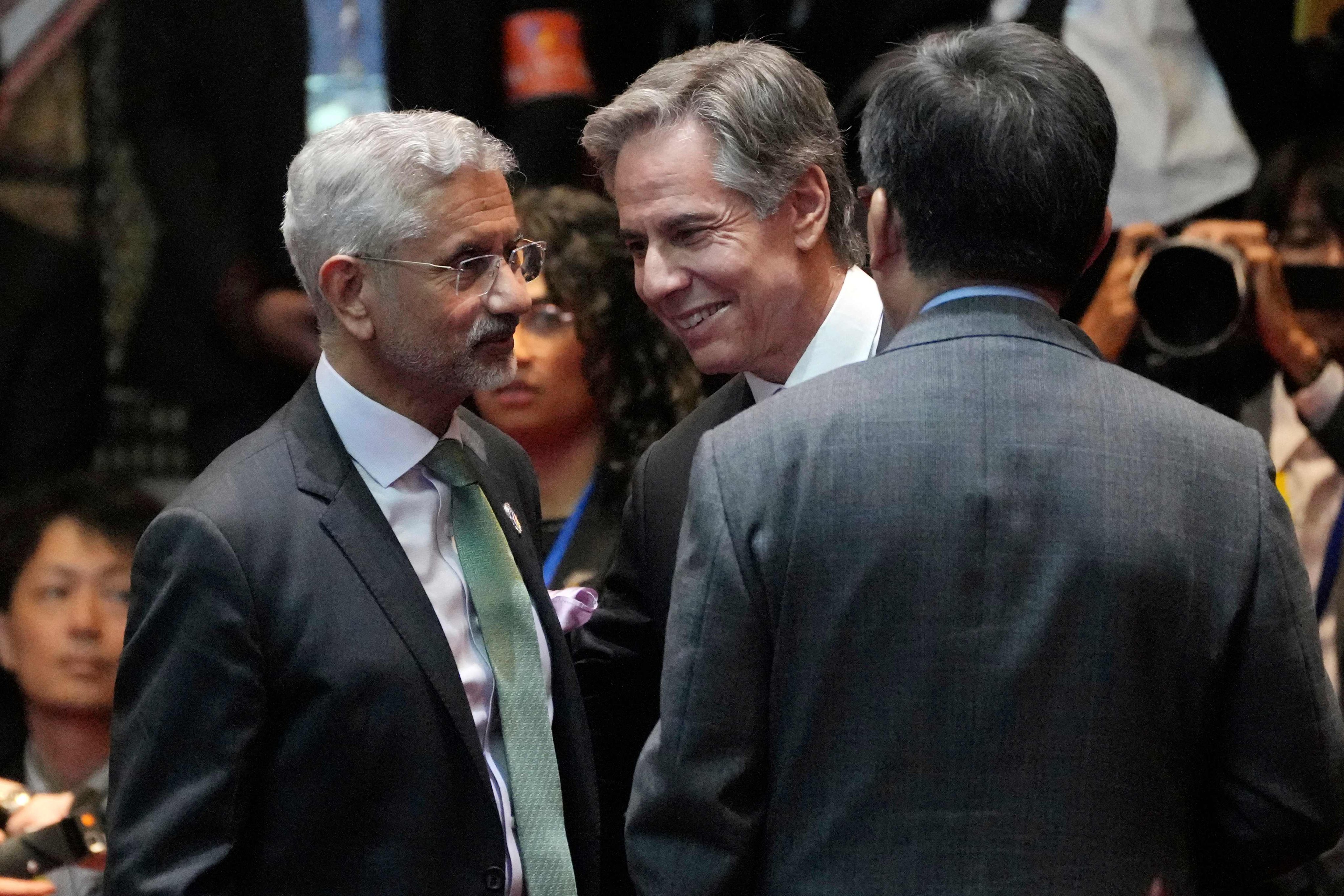 US Secretary of State Antony Blinken, centre, speaks to India’s Minister of External Affairs Subrahmanyam Jaishankar, left,  in Vientiane, Laos on Saturday. Photo: AFP