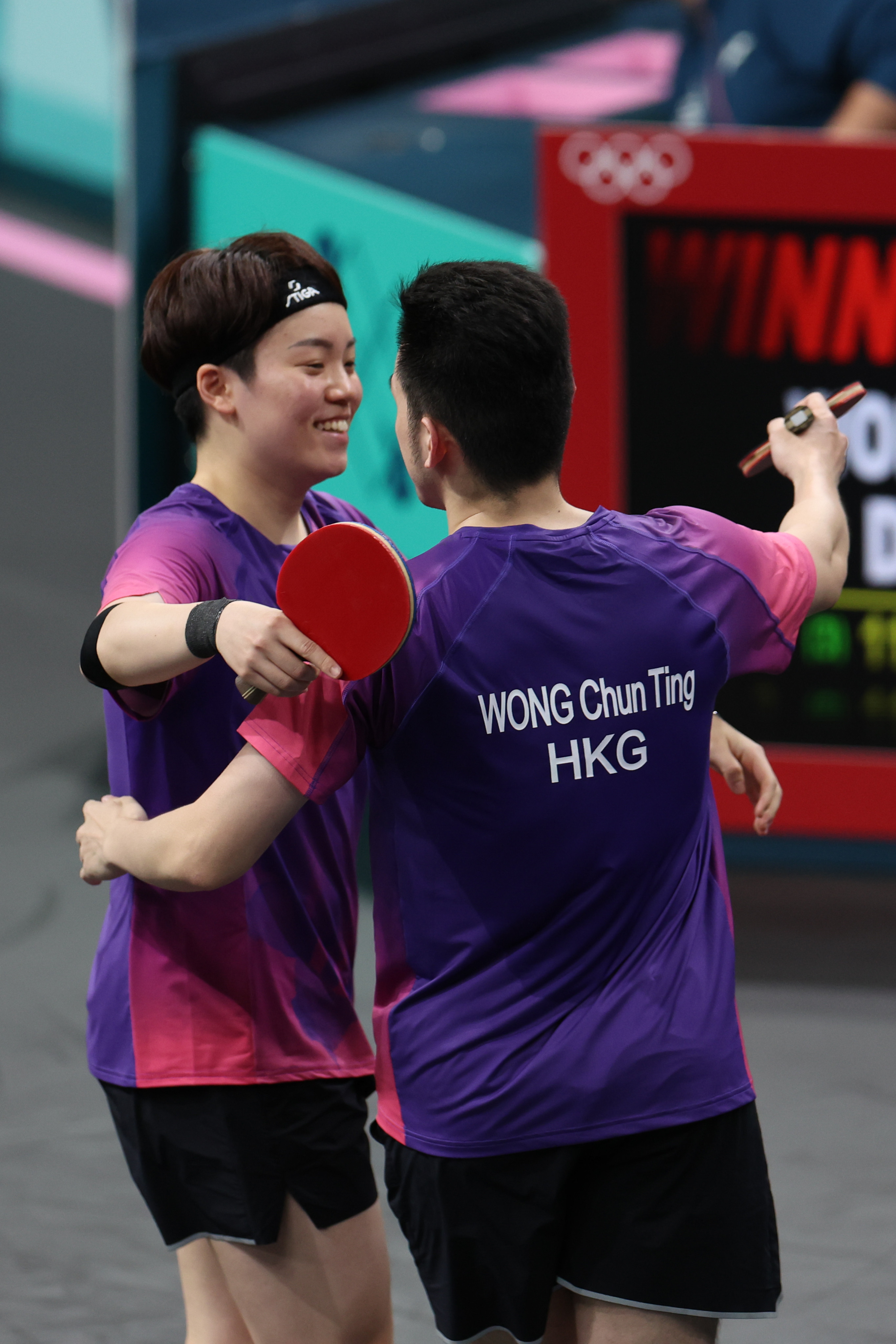 Hong Kong’s mixed doubles pair Doo Hoi-kem (left) and Wong Chun-ting are just one victory away from a guaranteed medal. Photo: Xinhua