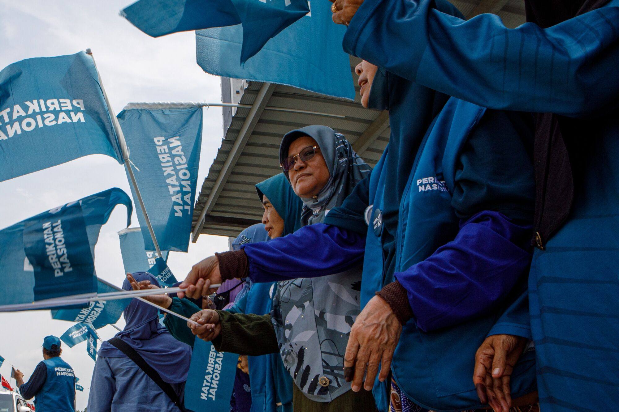 Supporters and members of Perikatan Nasional party near a polling station during state elections in Shah Alam, Selangor, Malaysia, in August 2023. Photo: Bloomberg