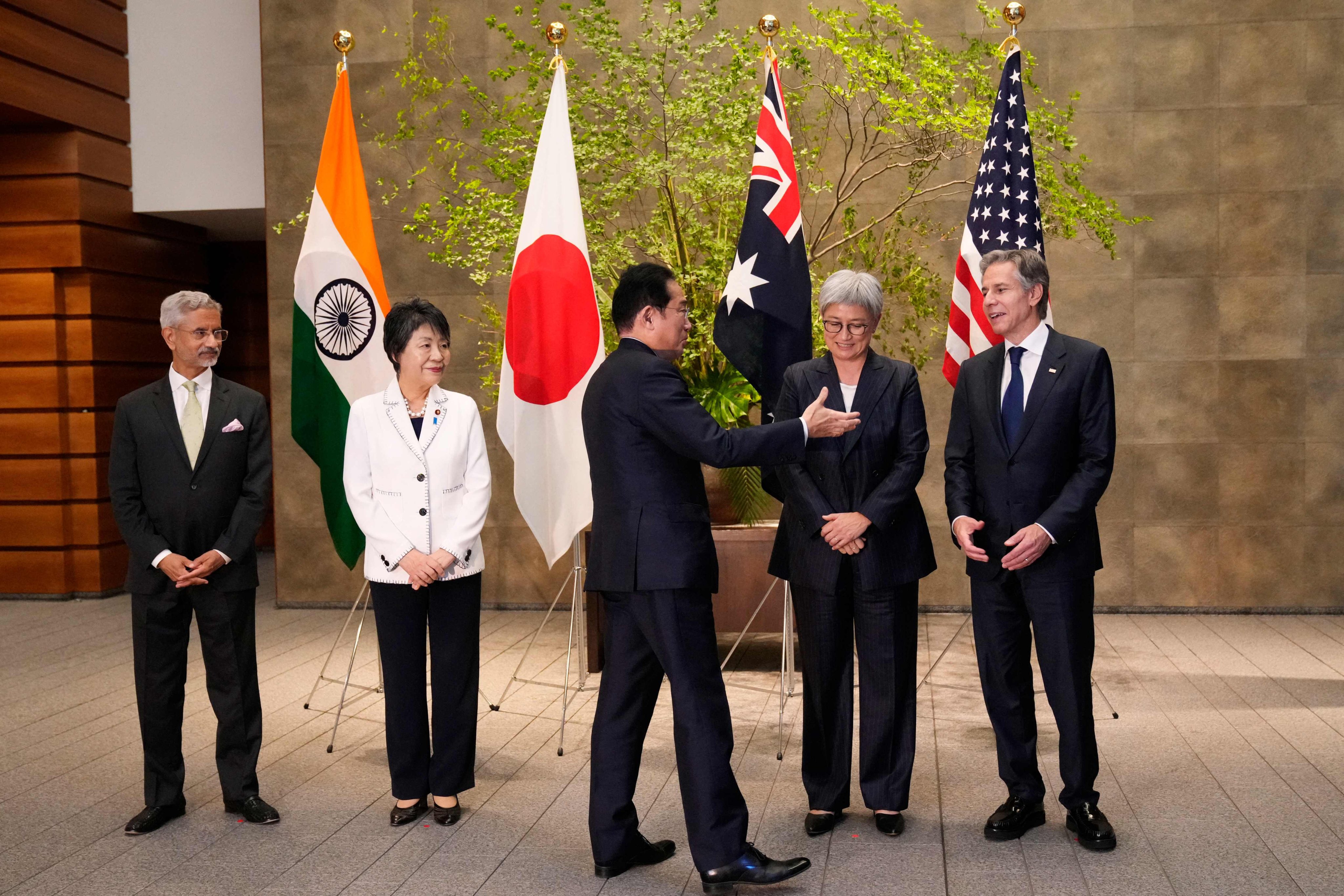 Japanese Prime Minister Fumio Kishida (centre) greets US Secretary of State Antony Blinken, as 
 foreign ministerial counterparts (from left) Subrahmanyam Jaishankar of India, Yoko Kamikawa of Japan and Penny Wong of Australia look on,  after their Quad meeting in Tokyo on Monday. Photo: AFP