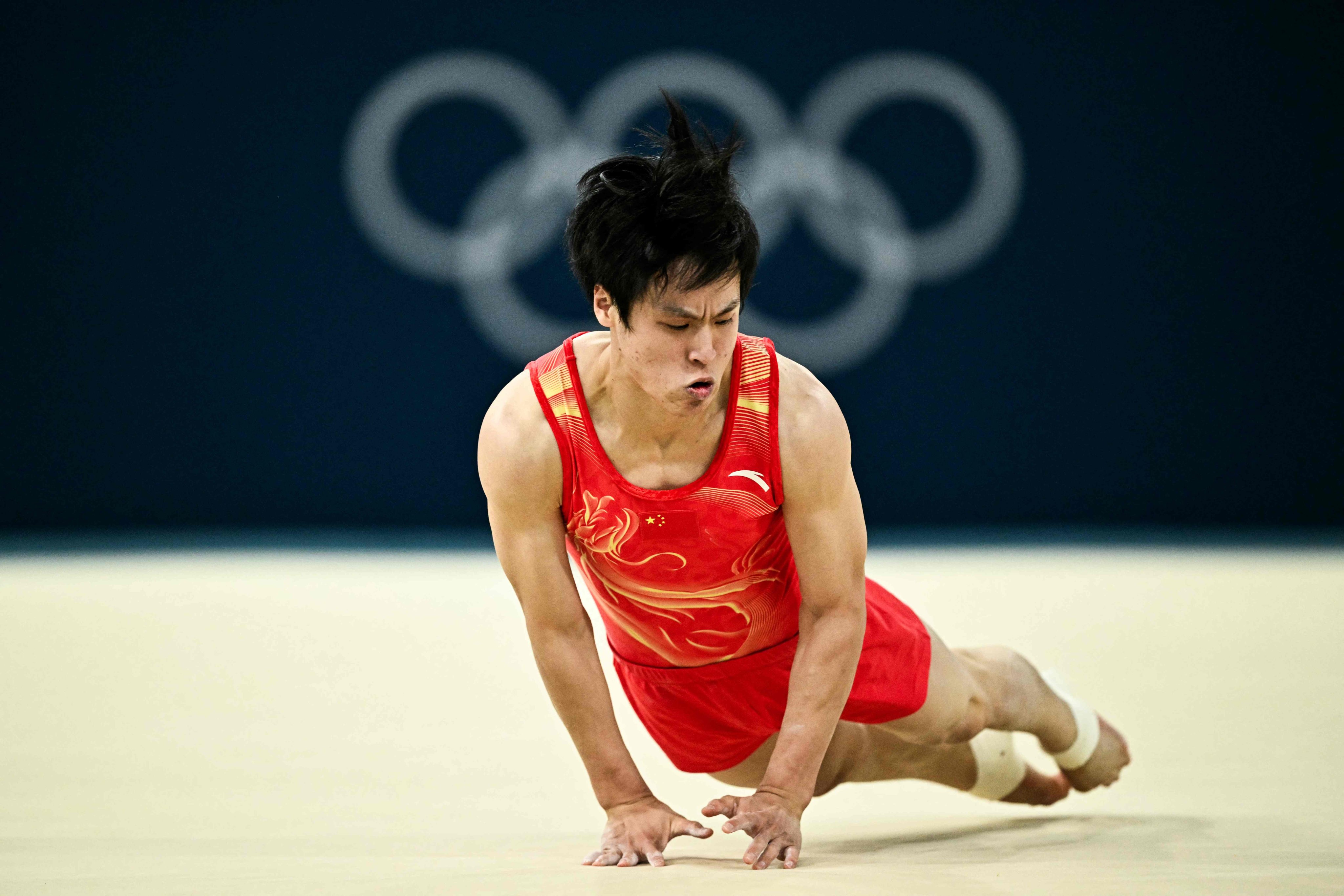 Su Weide made several blunders as China lost out on the men’s team gymnastics gold to Japan. Photo: AFP