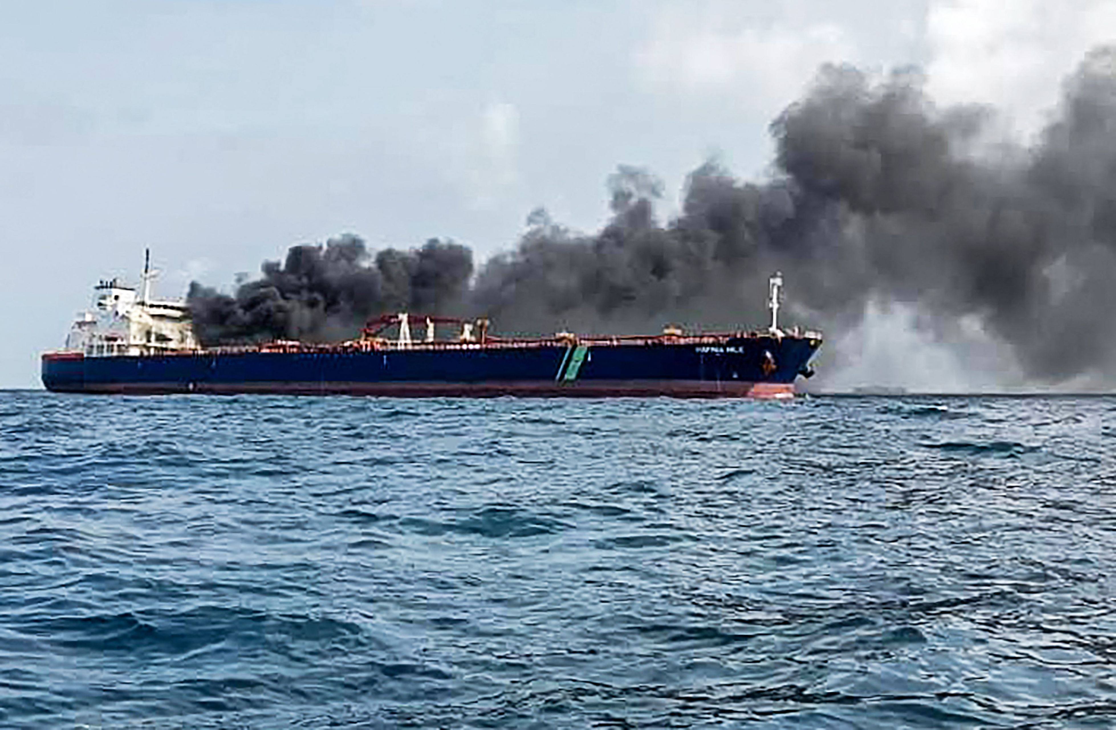 Two large oil tankers that collided and caught fire near Singapore are now anchored in Malaysian waters. Photo: Malaysian Maritime Enforcement/AFP