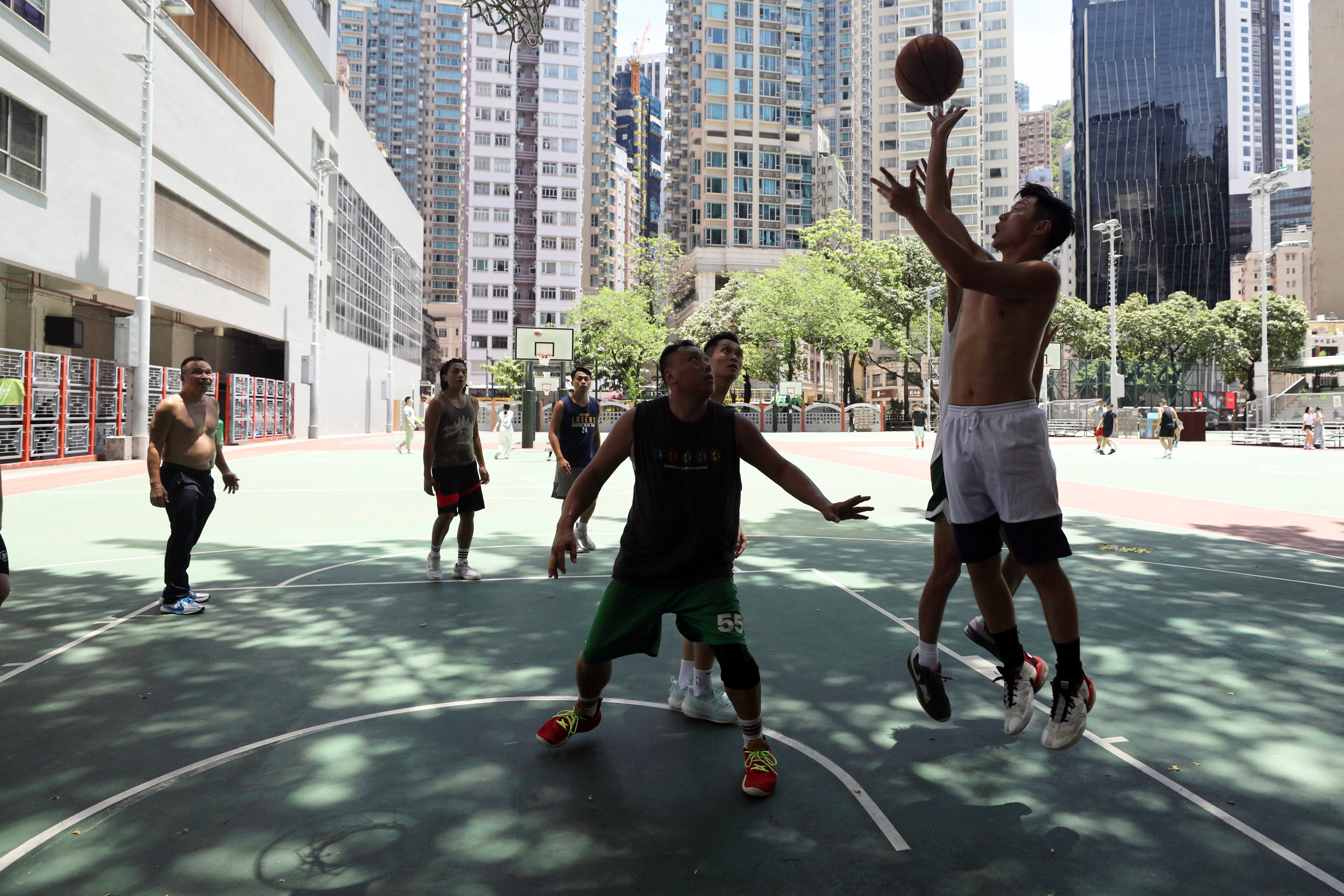 People play basketball in Hong Kong’s Southorn Playground. Photo: Xiaomei Chen