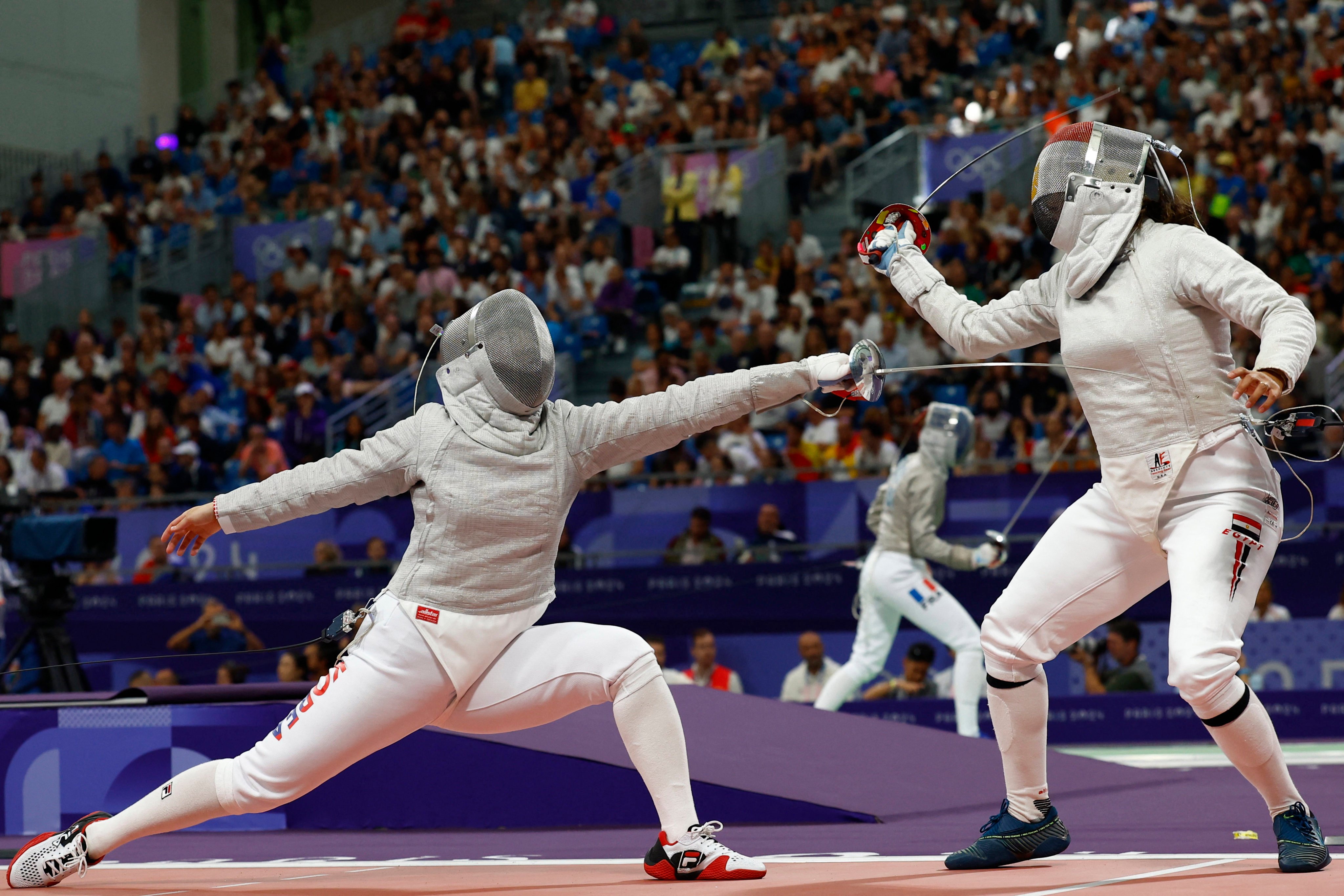 Nada Hafez of Egypt (right) in her loss to South Korea’s Jeon Ha-young in the round of 16 of the sabre event. Hafez has revealed that is she pregnant. Photo: Reuters