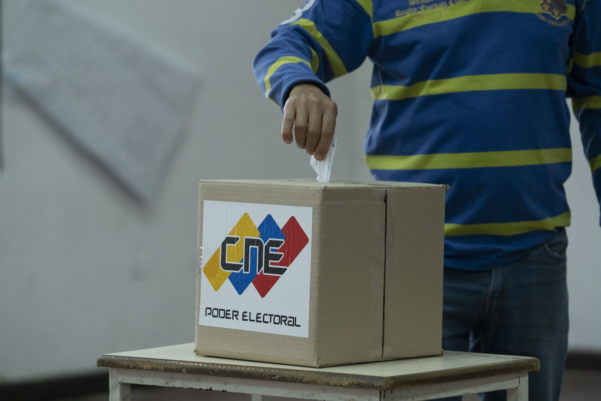 A voter casts a ballot during the presidential election in Caracas, Venezuela, on July 28. A regional body observing the election says the results cannot be recognised. Photo: Bloomberg