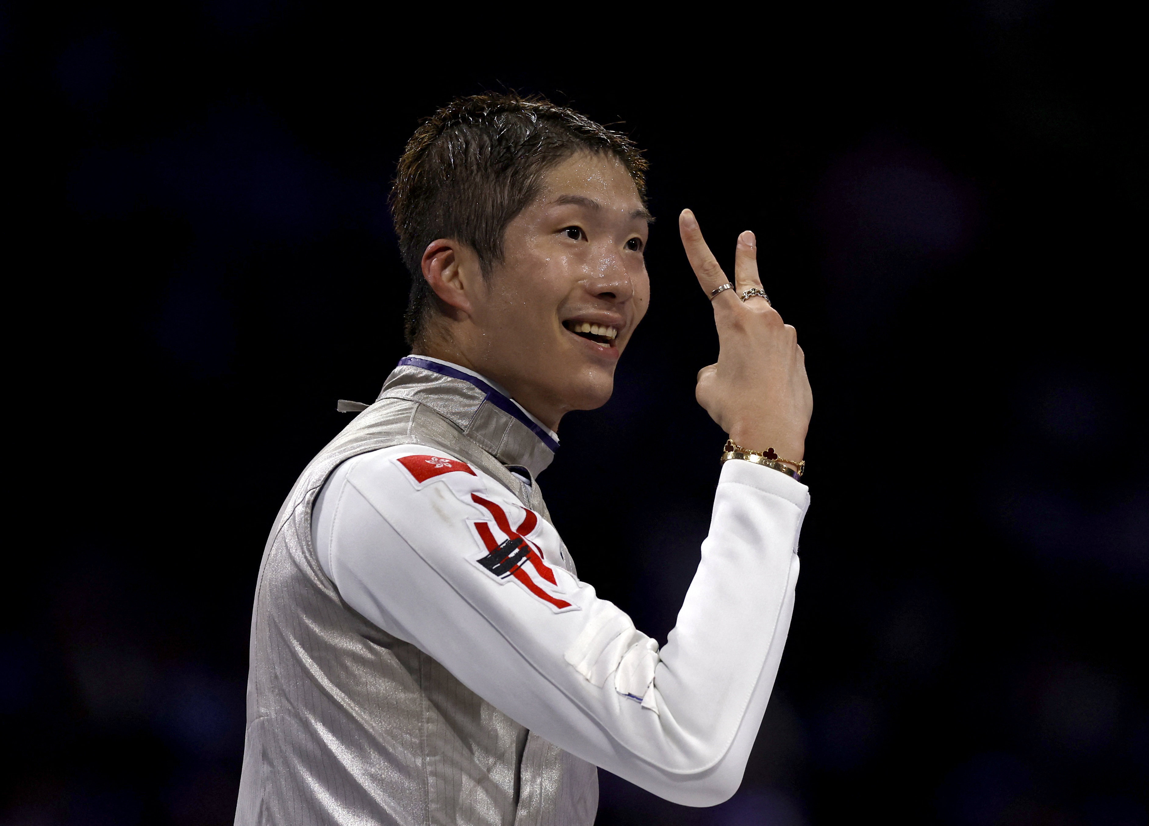 Cheung Ka-long celebrates his Olympic triumph in Paris. Photo: Reuters