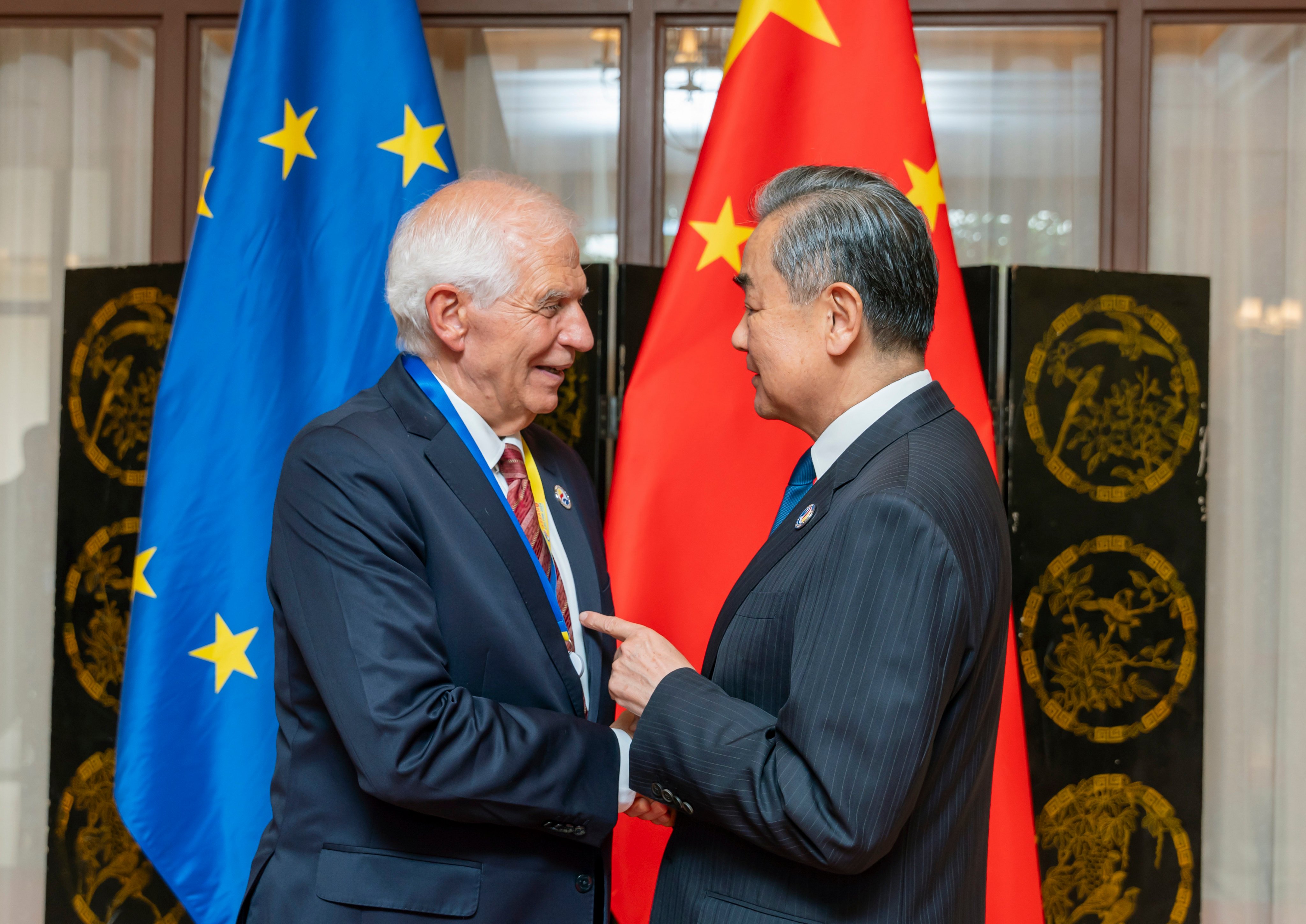 EU foreign affairs chief Josep Borrell (left) meets Chinese Foreign Minister Wang Yi in Vientiane, Laos,  on Friday. Photo: Xinhua